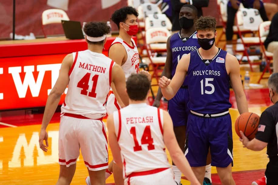 Basketball players wearing masks