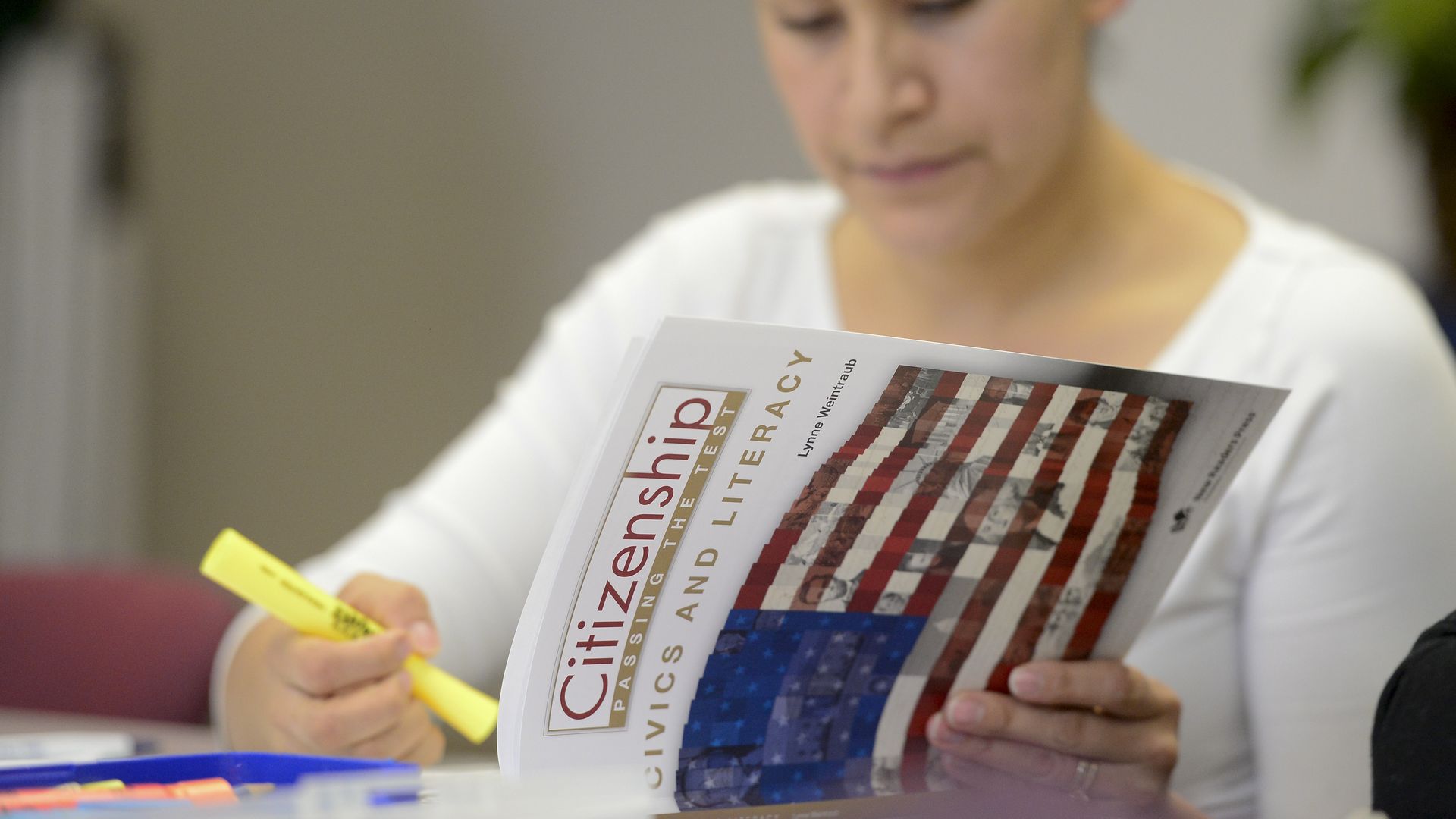 Maria Elena Sanchez takes a practice U.S. citizenship test at el Comite in Longmont, Colorado.
