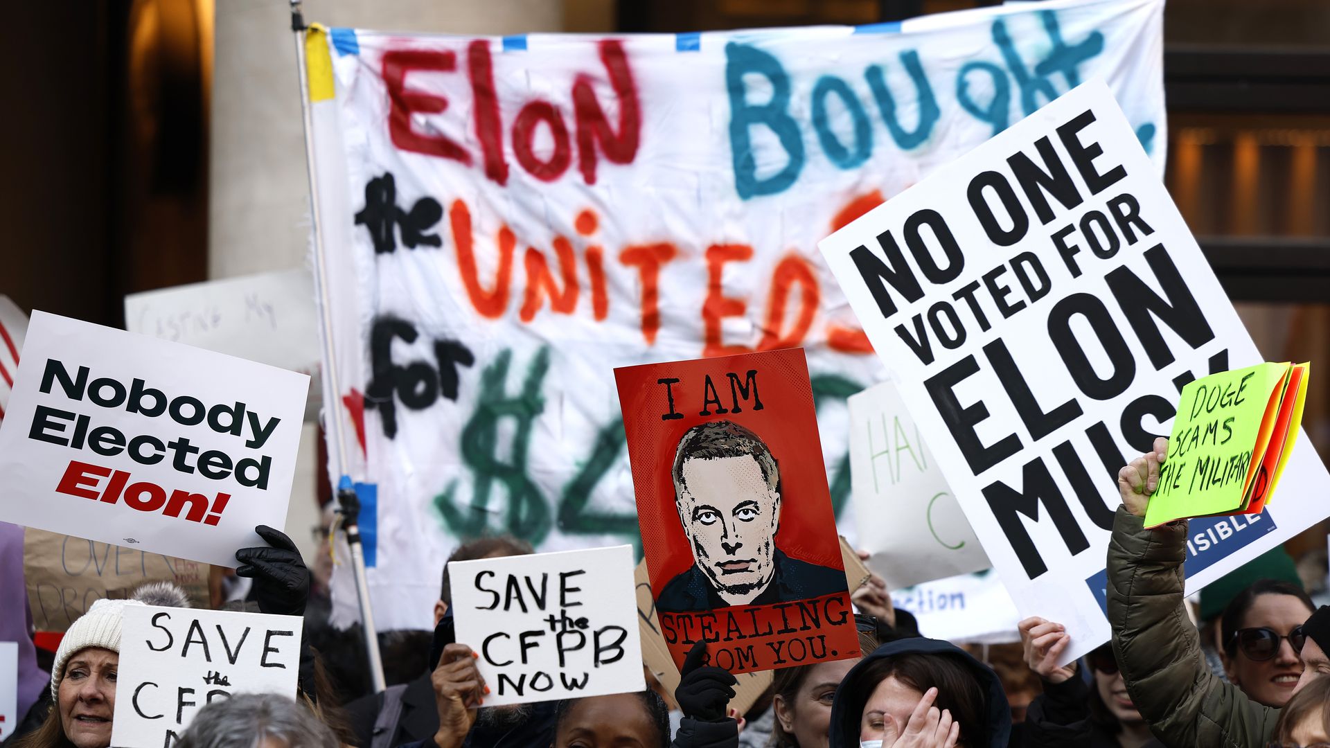  Protesters rally outside the Consumer Financial Protection Bureau (CFPB) on February 10, 2025 in Washington, DC. 