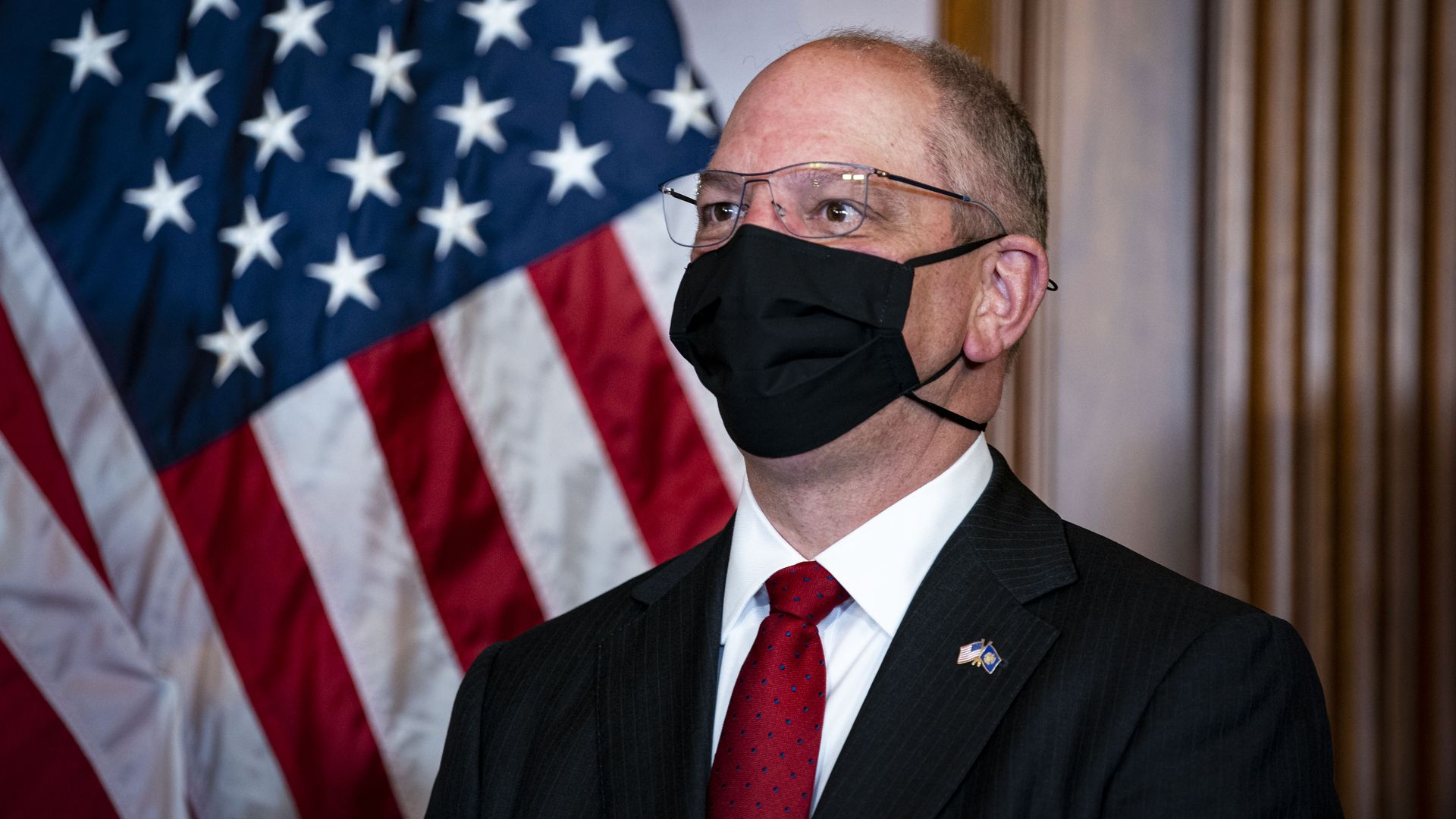 Louisiana Gov. John Bel Edwards wears a protective mask in the U.S. Capitol in Washington, D.C., U.S., on Tuesday, May 11, 2021.