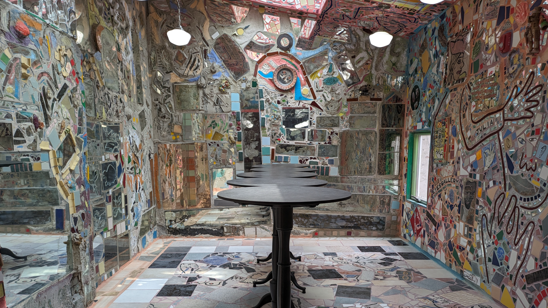 A new room in Jim's Steaks is completely covered with tile-and-glass mosaics from folk-artist Isaiah Zagar.  