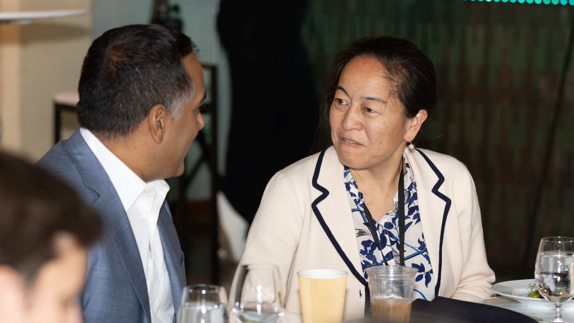 Sachin Jain of SCAN Group speaks to Lynn Chou O'Keefe of Define Ventures at the EV lunch.  Photo: Chris Constantine