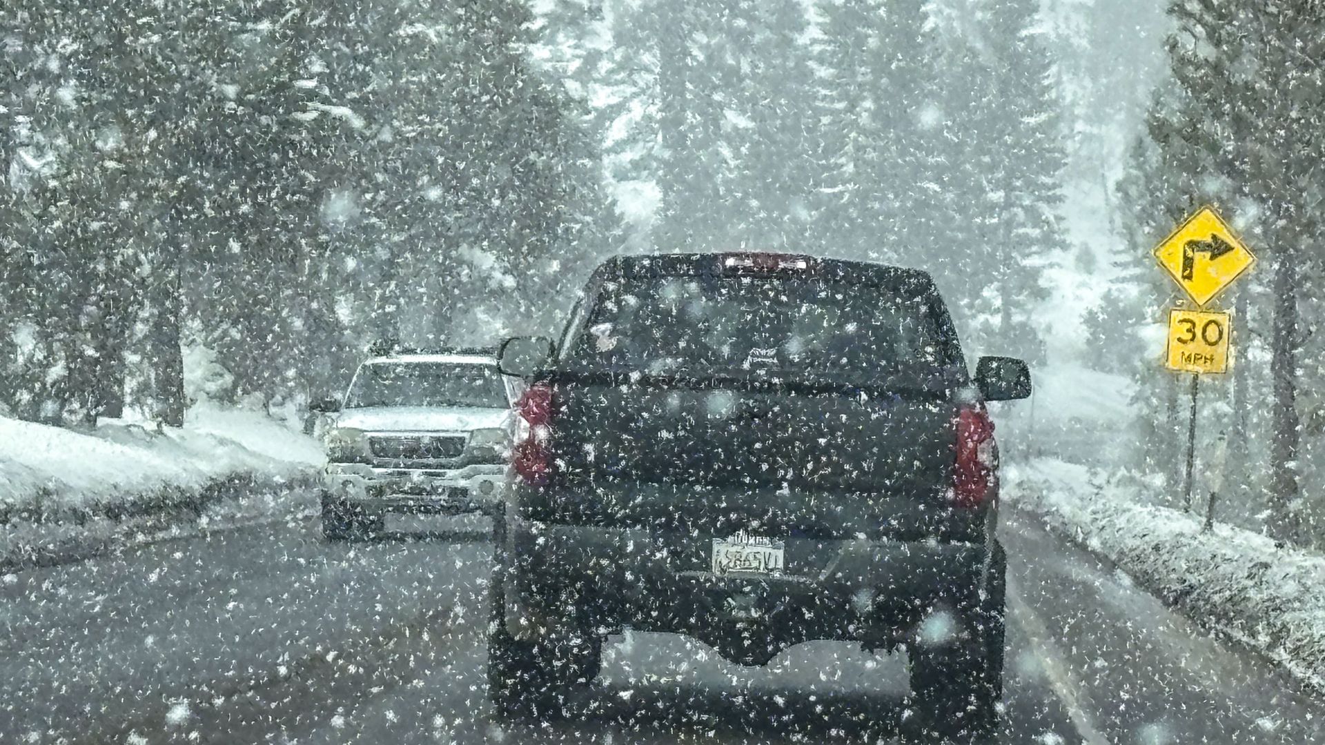 A fast-moving storm drops several inches of fresh snow along Hwy 50 near Echo Summit on February 8, 2024, in South Lake Tahoe, California. 
