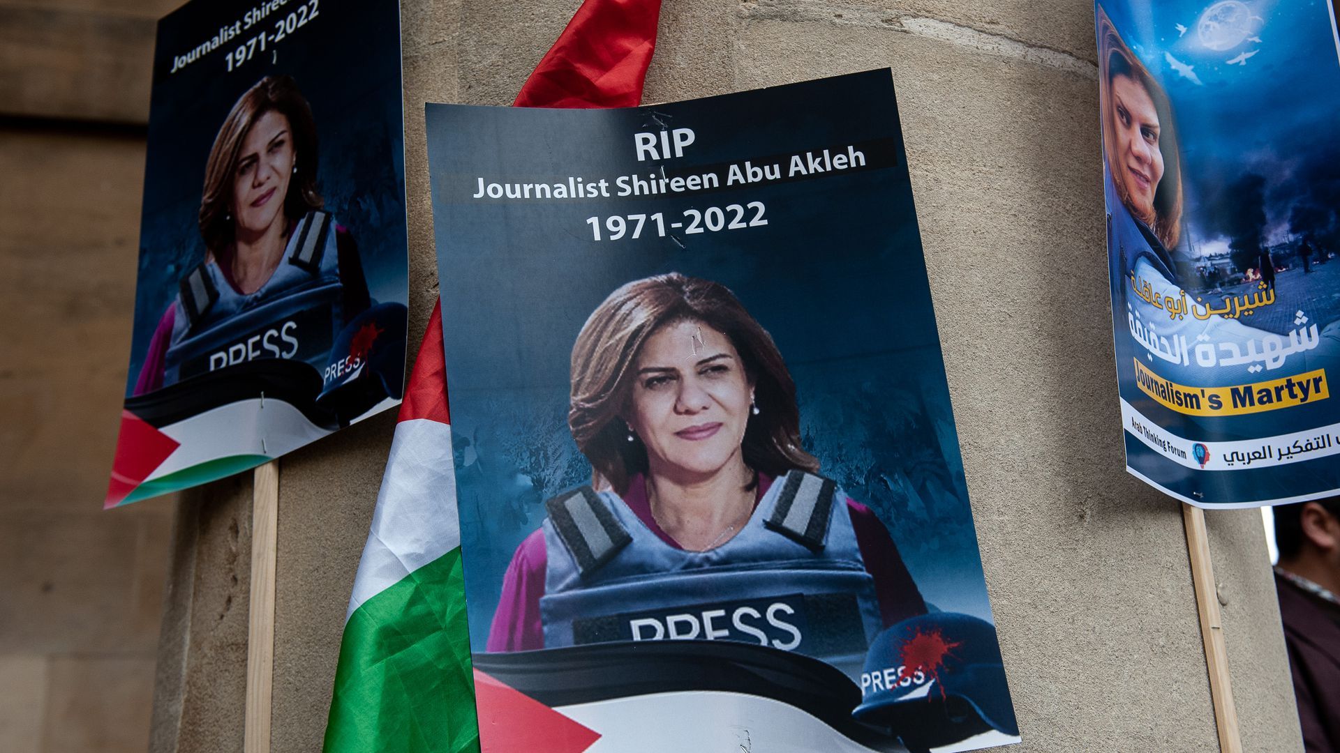 Posters showing the image of Palestinian American journalist Shireen Abu Akleh. Photo: Guy Smallman/Getty Images