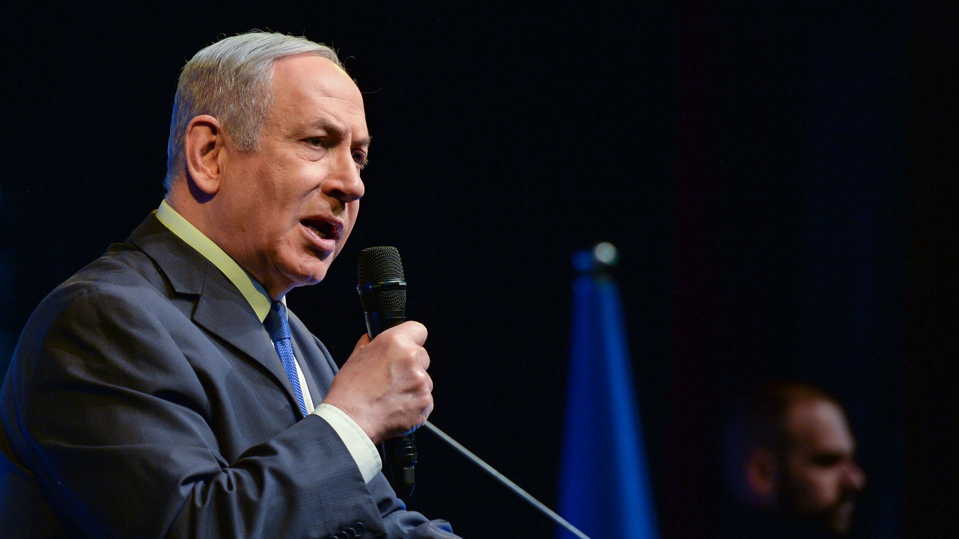 Picture of Israeli Prime Minister Benjamin Netanyahu speaking into a microphone