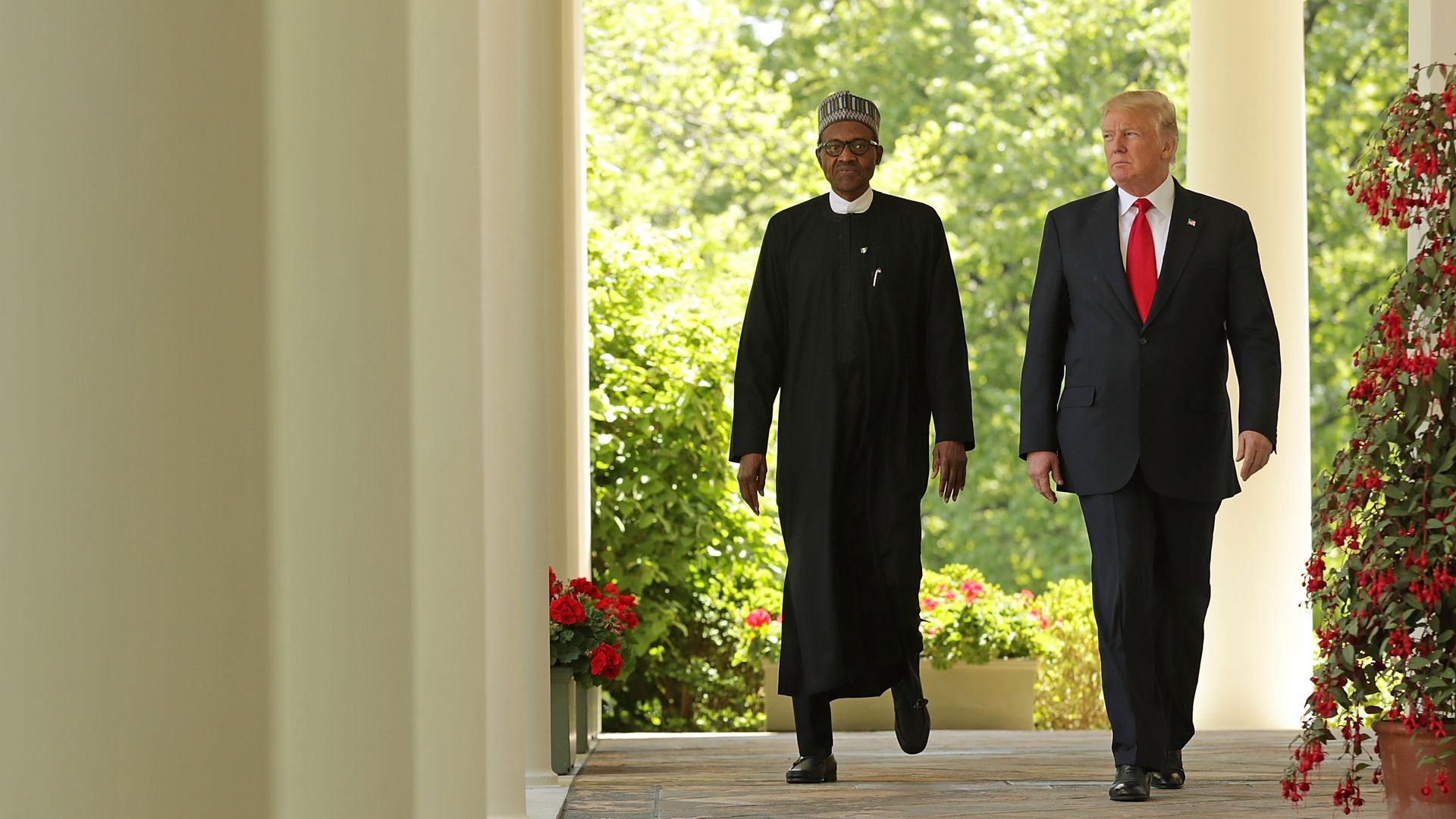 Trump walking with Nigerian President Buhari