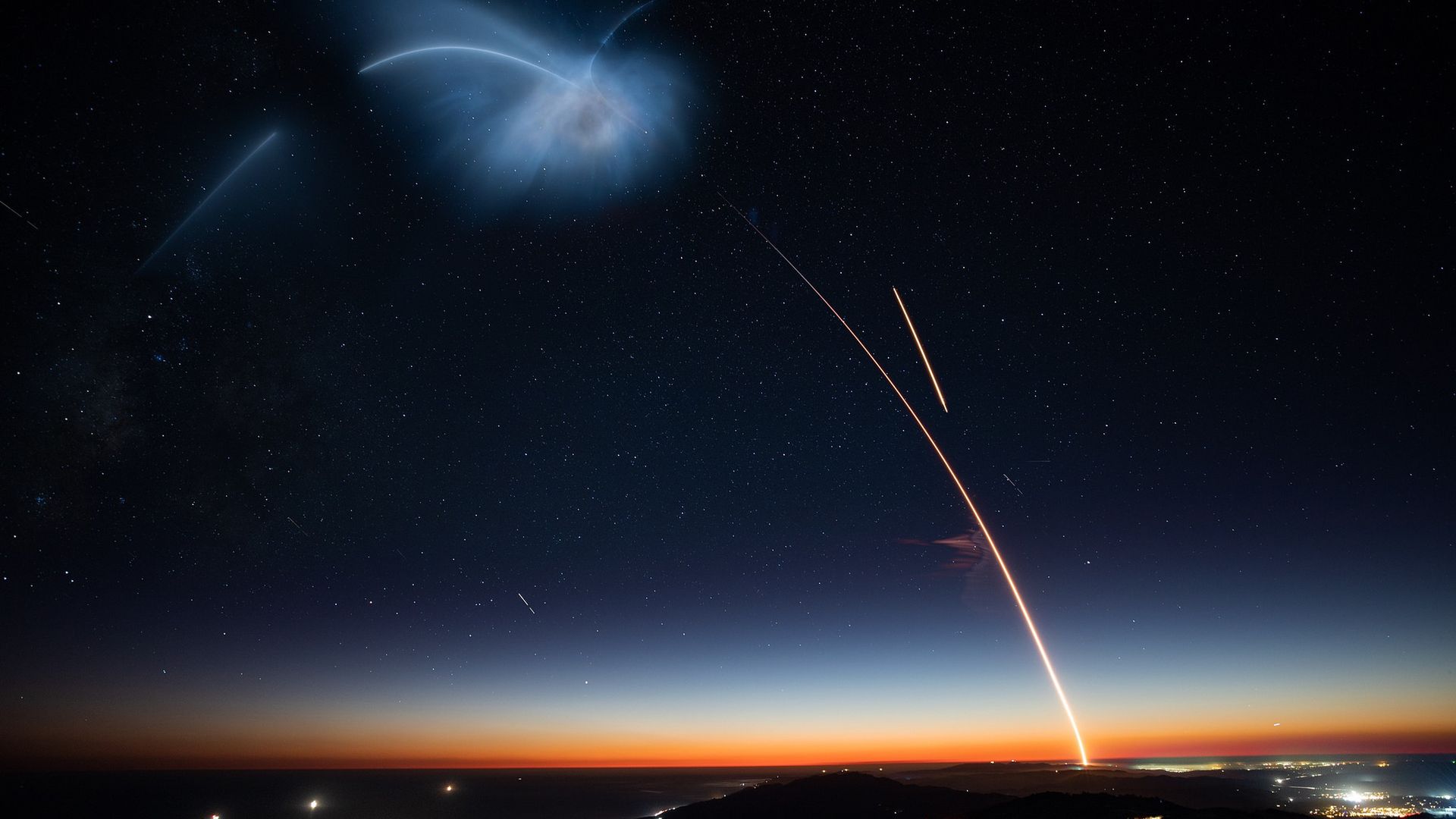 Long-exposure photo of a SpaceX launch and landing from Vandenberg, AFB in California.