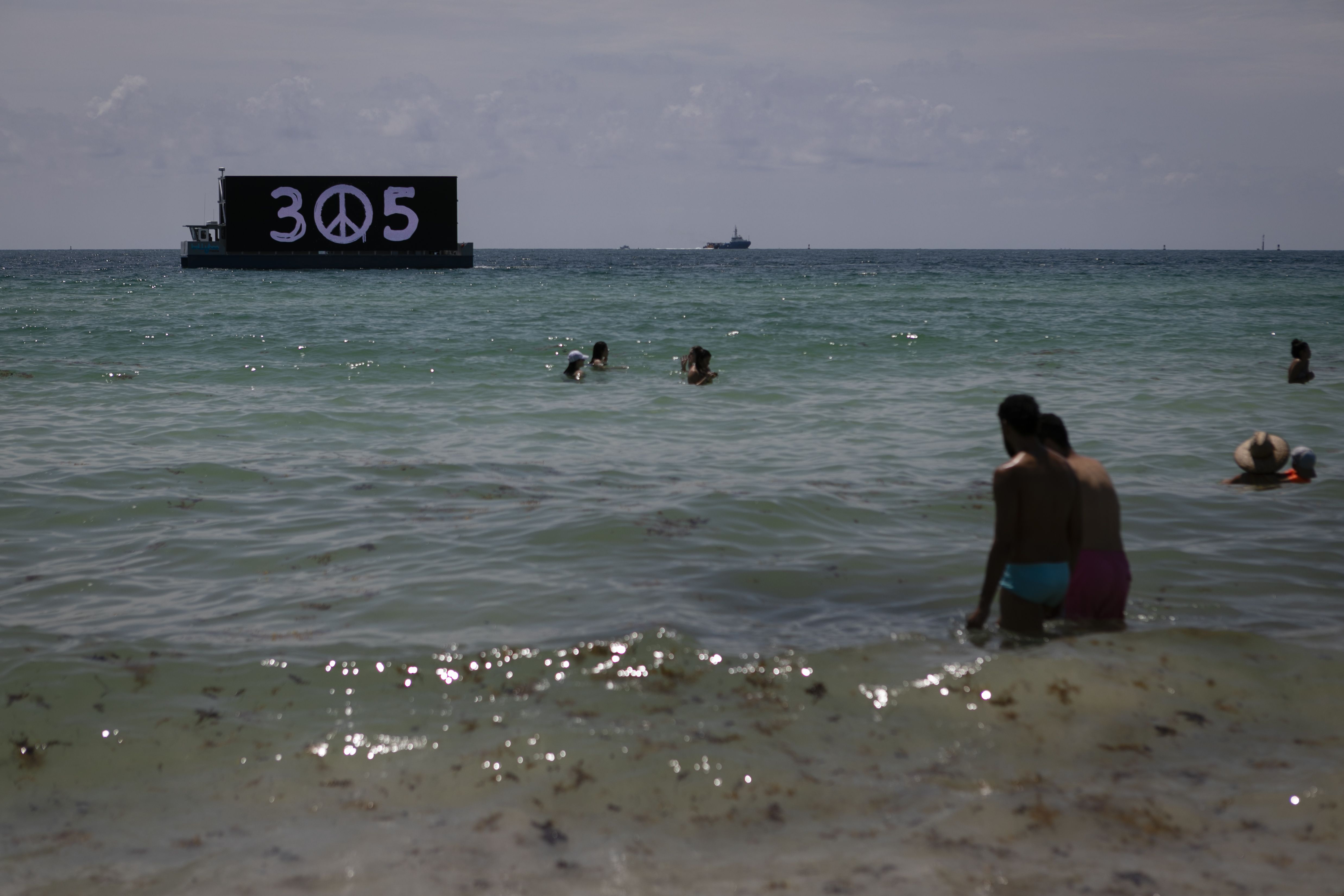FLORIDA, USA - JUNE 10: Beachgoers are seen on the beach as Miami reopens beaches after measures against the novel coronavirus (COVID-19) began to be lifted in Miami Beach, Florida, United States on June 10, 2020. (Photo by Eva Marie Uzcategui Trinkl/Anadolu Agency via Getty Images)
