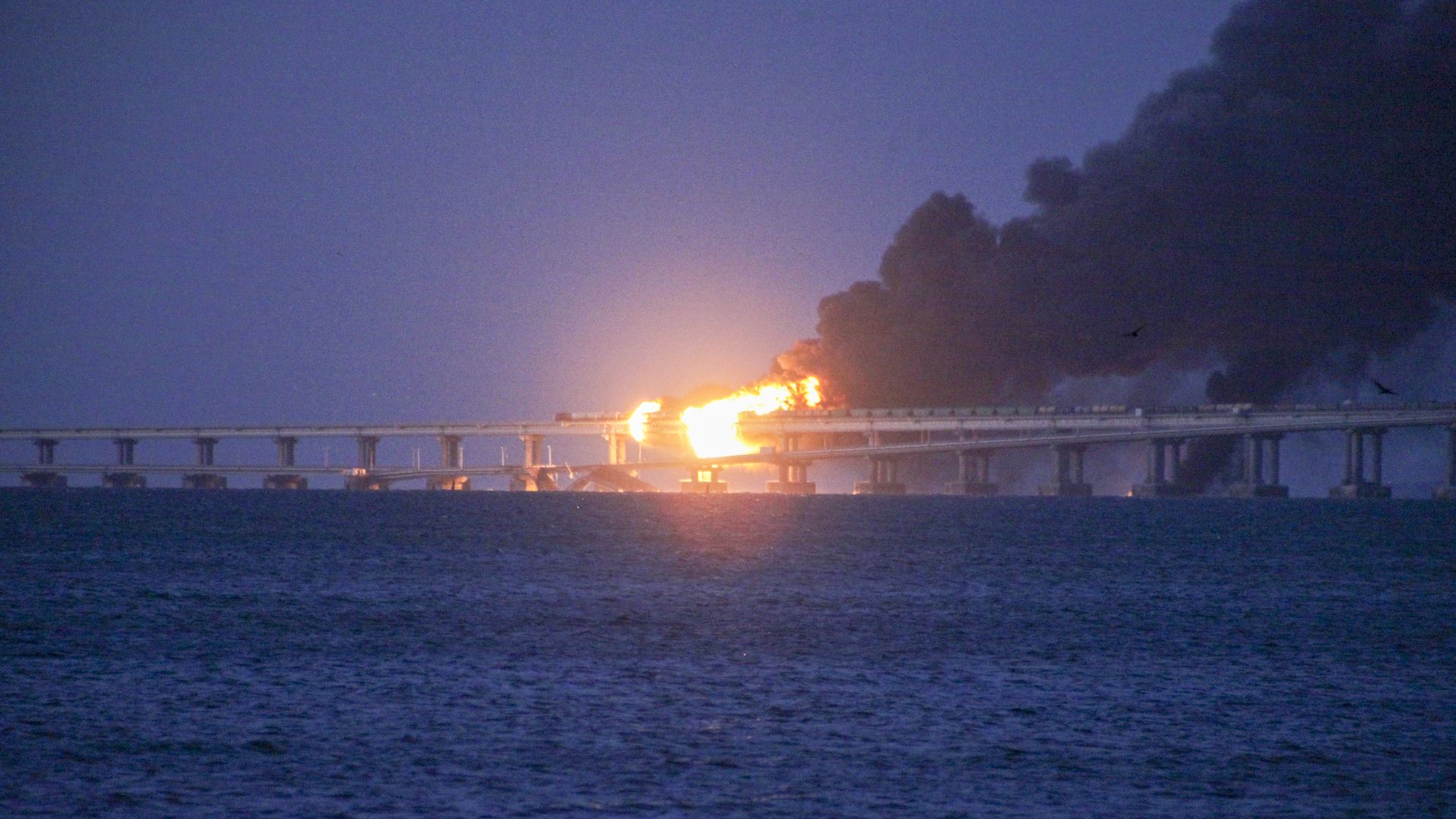 Explosion causes fire at the Kerch bridge in the Kerch Strait, Crimea on Oct. 8
