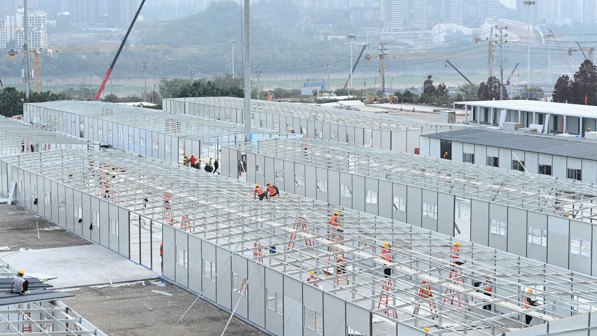 Workers build field hospital in China amid a new COVID-19 outbreak.