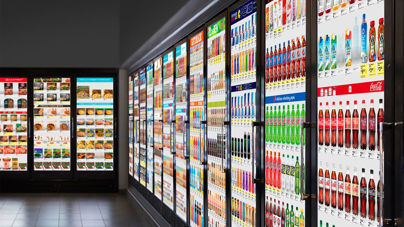 Walgreens' refrigerated coolers have become giant digital billboards