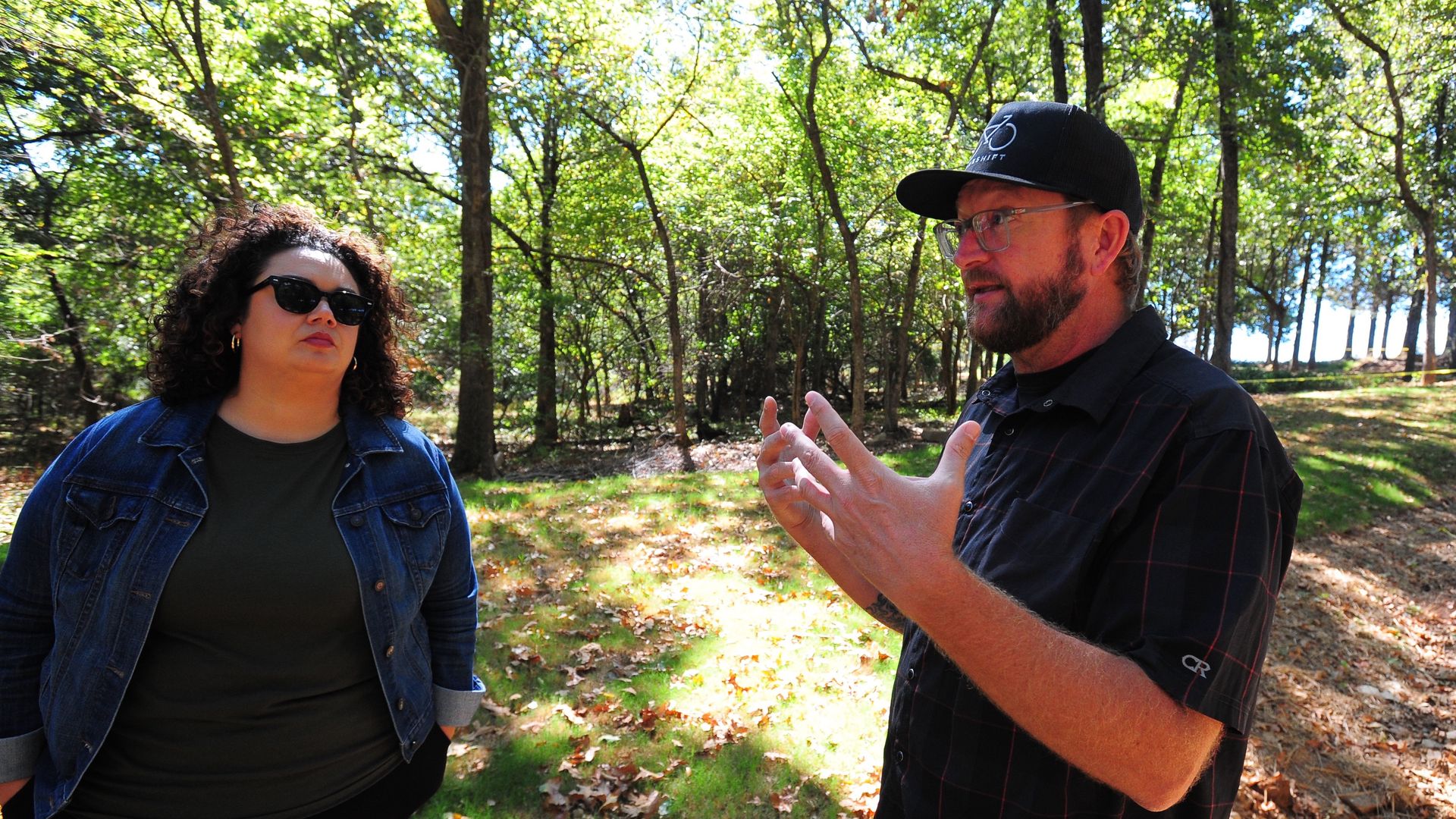 Hazel Hernandez and Brannon Park with Experience Fayetteville show off the new cyclo-cross course at Centennial Park. Photo: Worth Sparkman/Axios.
