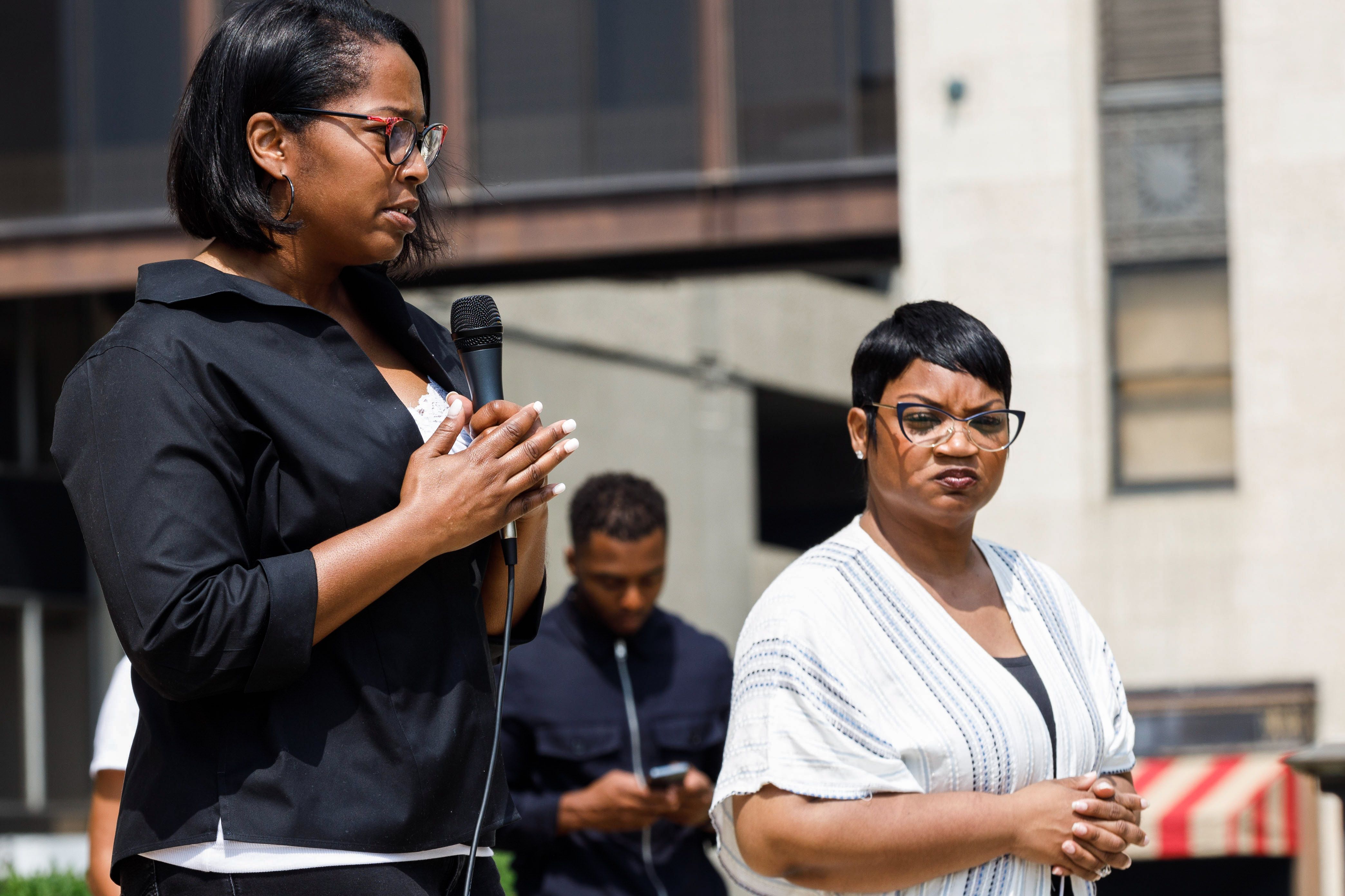 Columbus police officials speak at an anti-violence rally.