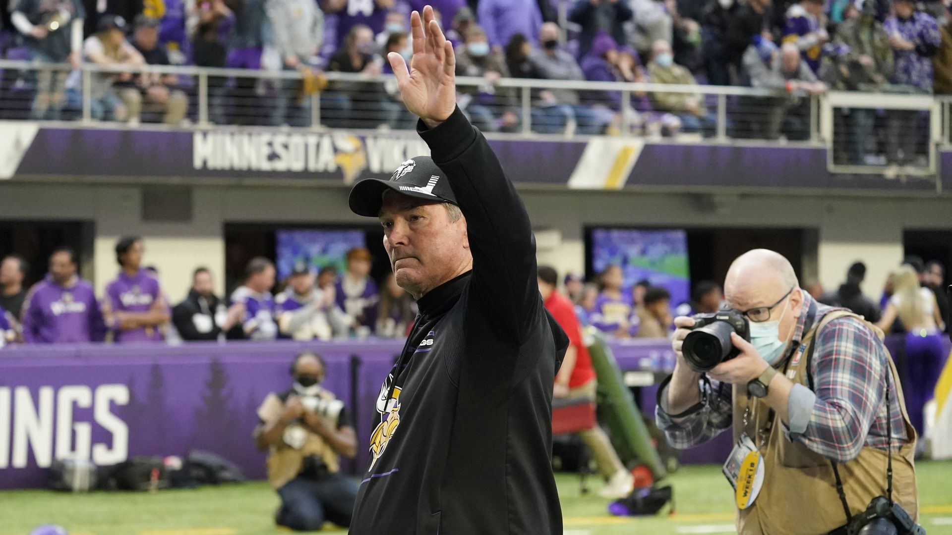 Mike Zimmer waves to fans 