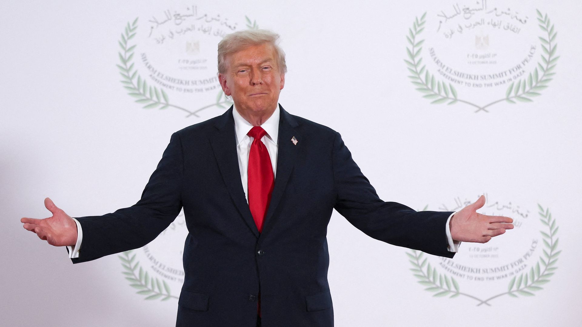 Donald Trump poses for a photo during a world leaders' summit on ending the Gaza war in Sharm El-Sheikh, Egypt.