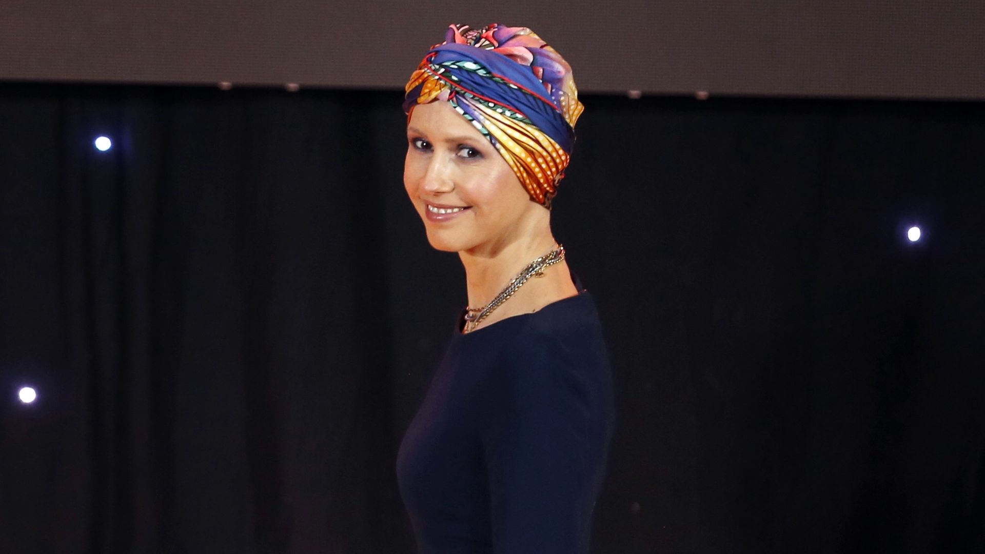 Syria's First Lady Asma al-Assad takes part in a graduation ceremony of future teachers of a Syrian Organisation for Persons with Disabilities, in Damascus on December 3, 2018.