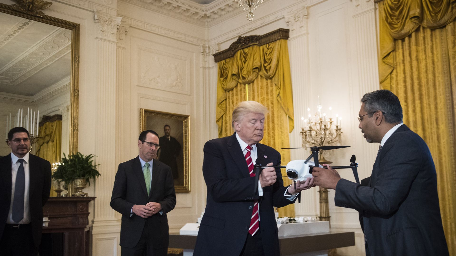 The president examines a drone