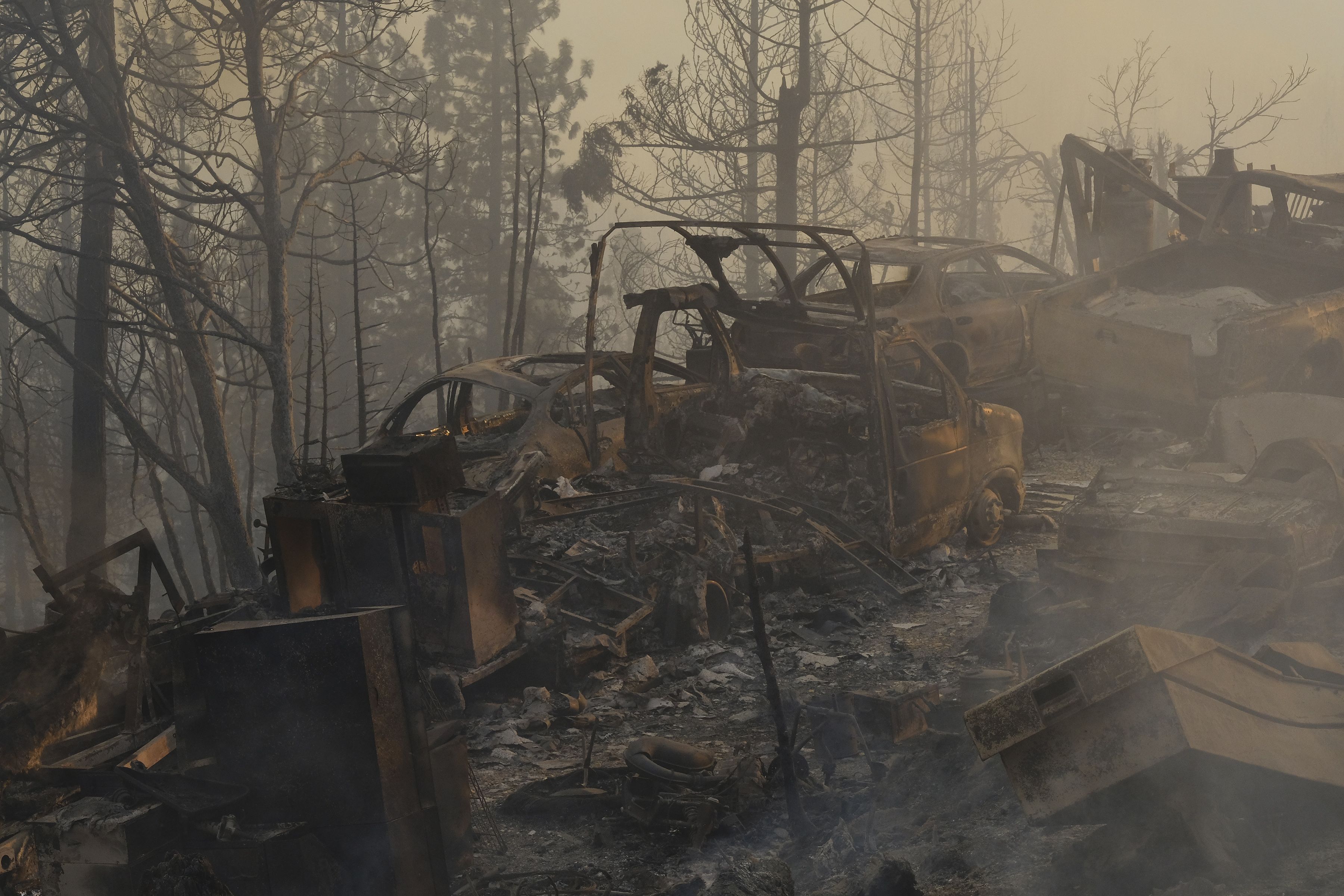 The husks of vehicles burned by the Mosquito Fire near Michigan Bluff, California, on Sept. 7.