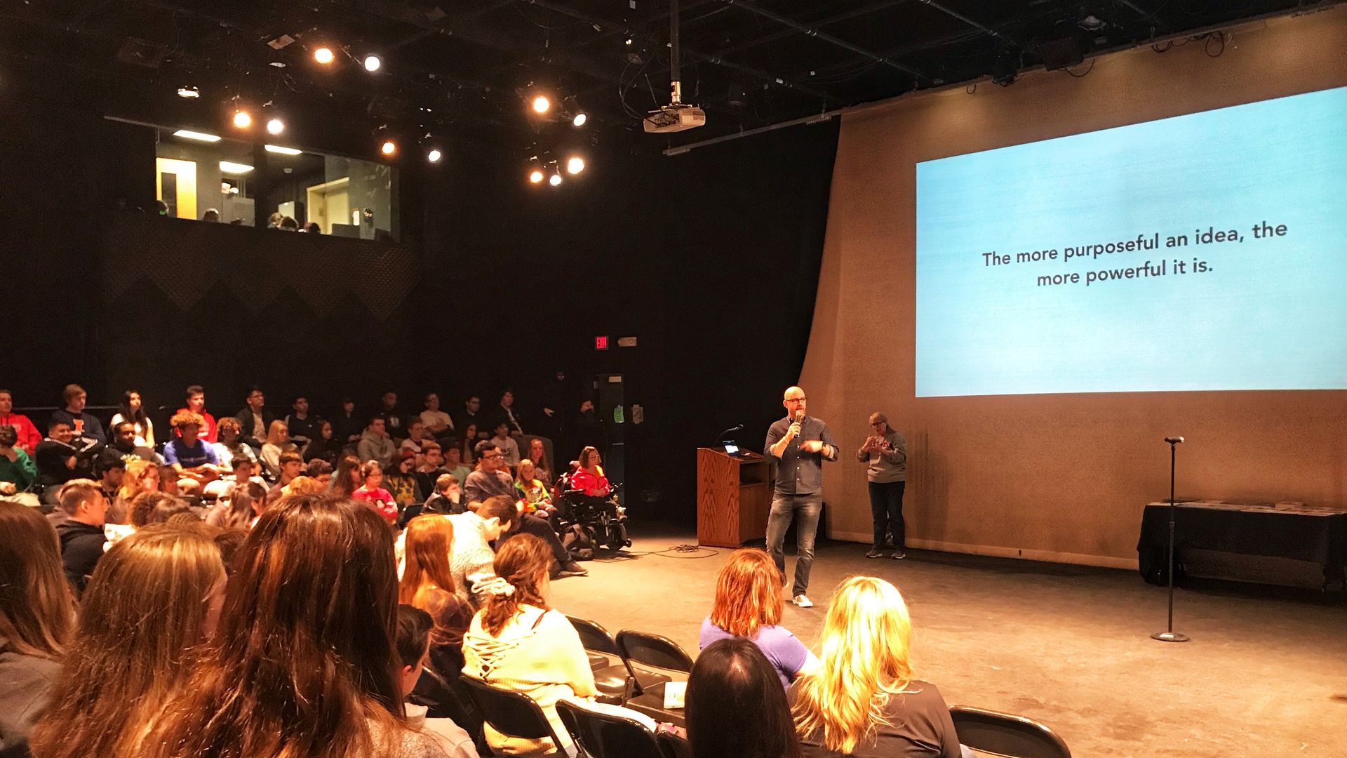 guy in front of screen 