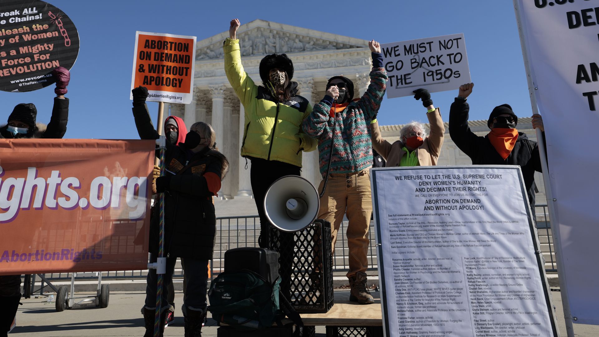 Abortion rights supporters are seen in front of the Supreme Court to mark the Roe v. Wade anniversary.