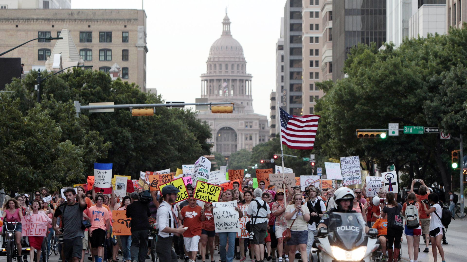 Pro-choice protesters march down Congress Avenue and back to the Texas state capitol