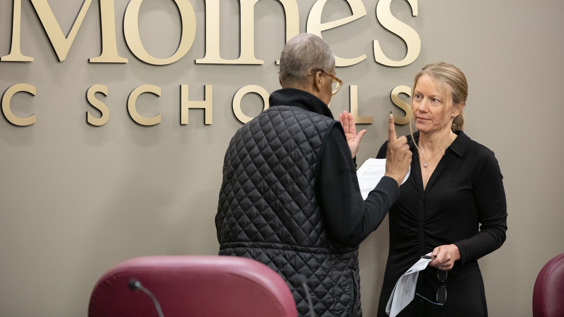 Teree caldwell johnson stands in front of jackie norris