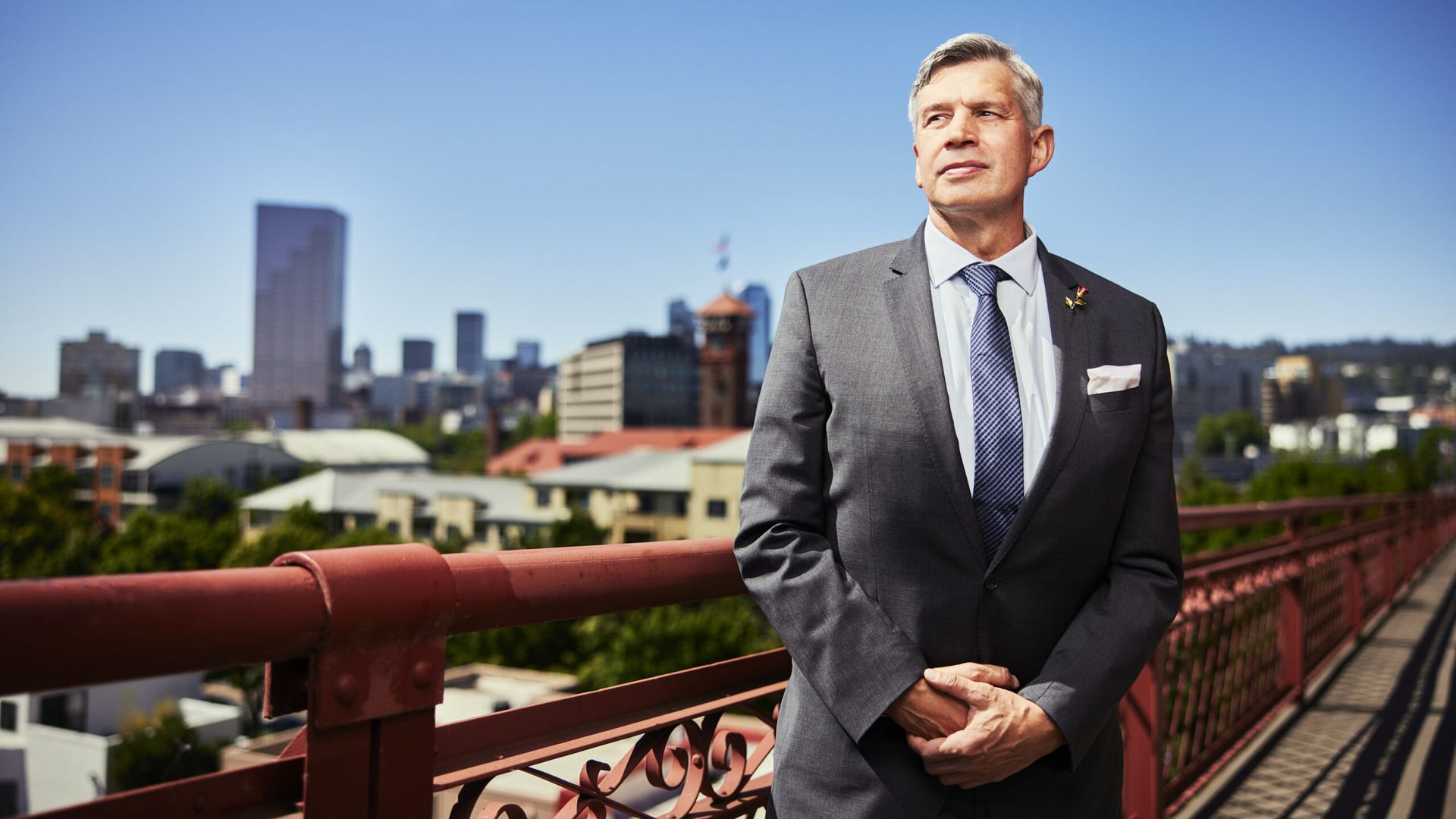 Man in suit on bridge