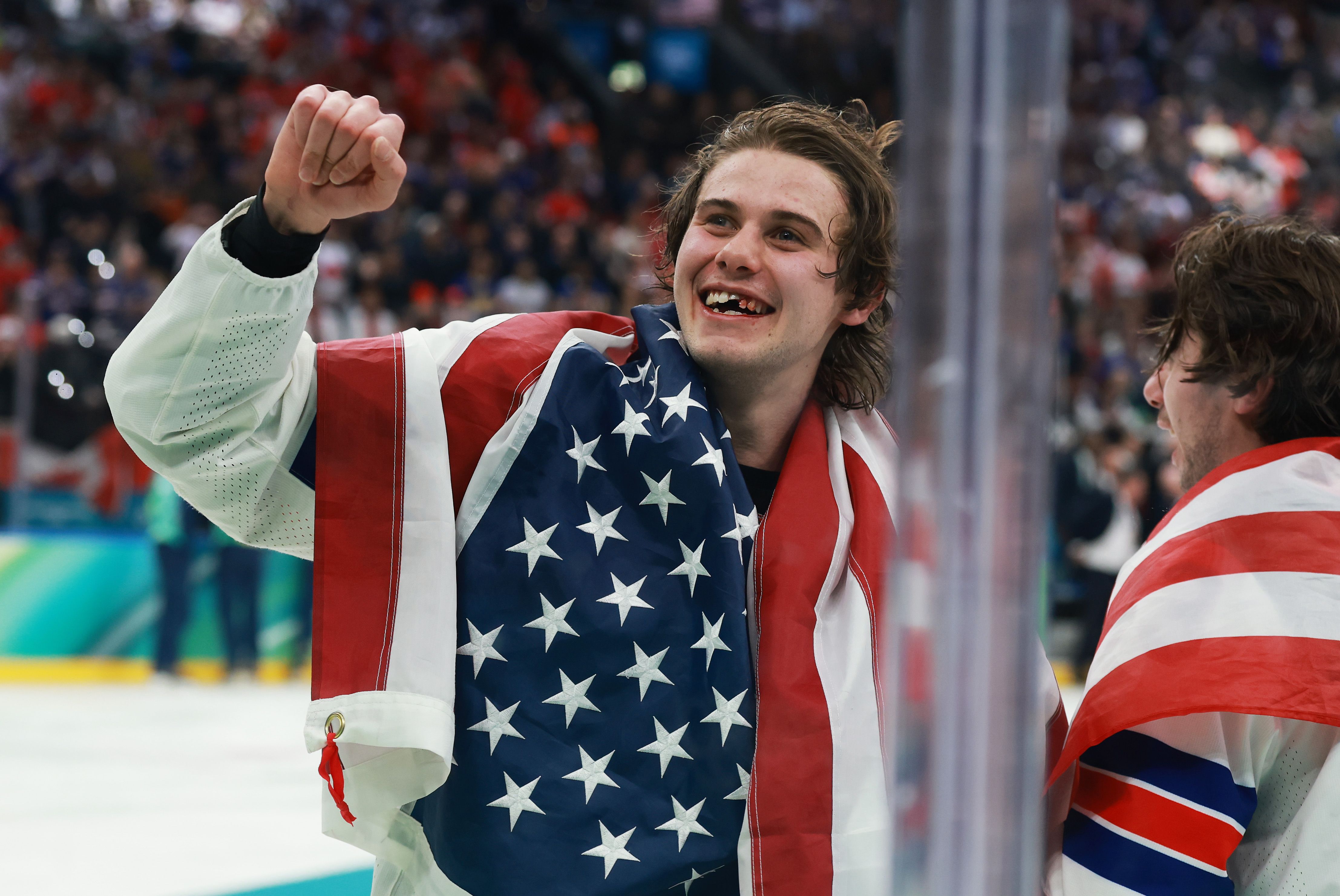 Jack Hughes celebrates after scoring the game-winning goal to win the gold medal game against Canada.