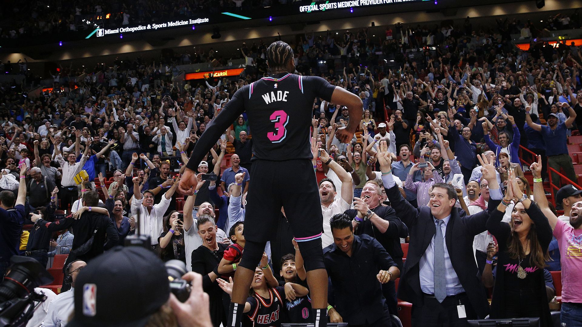 Dwyane Wade #3 of the Miami Heat celebrates after hitting a game-winning three pointer against the Golden State Warriors