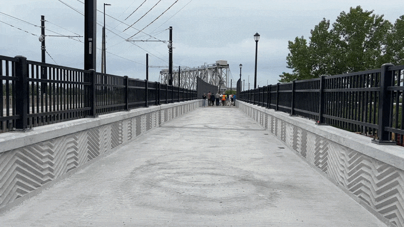 GIF shows a sped-up video of going down the new Grand Boulevard pedestrian bridge from the River Market to the riverfront. 