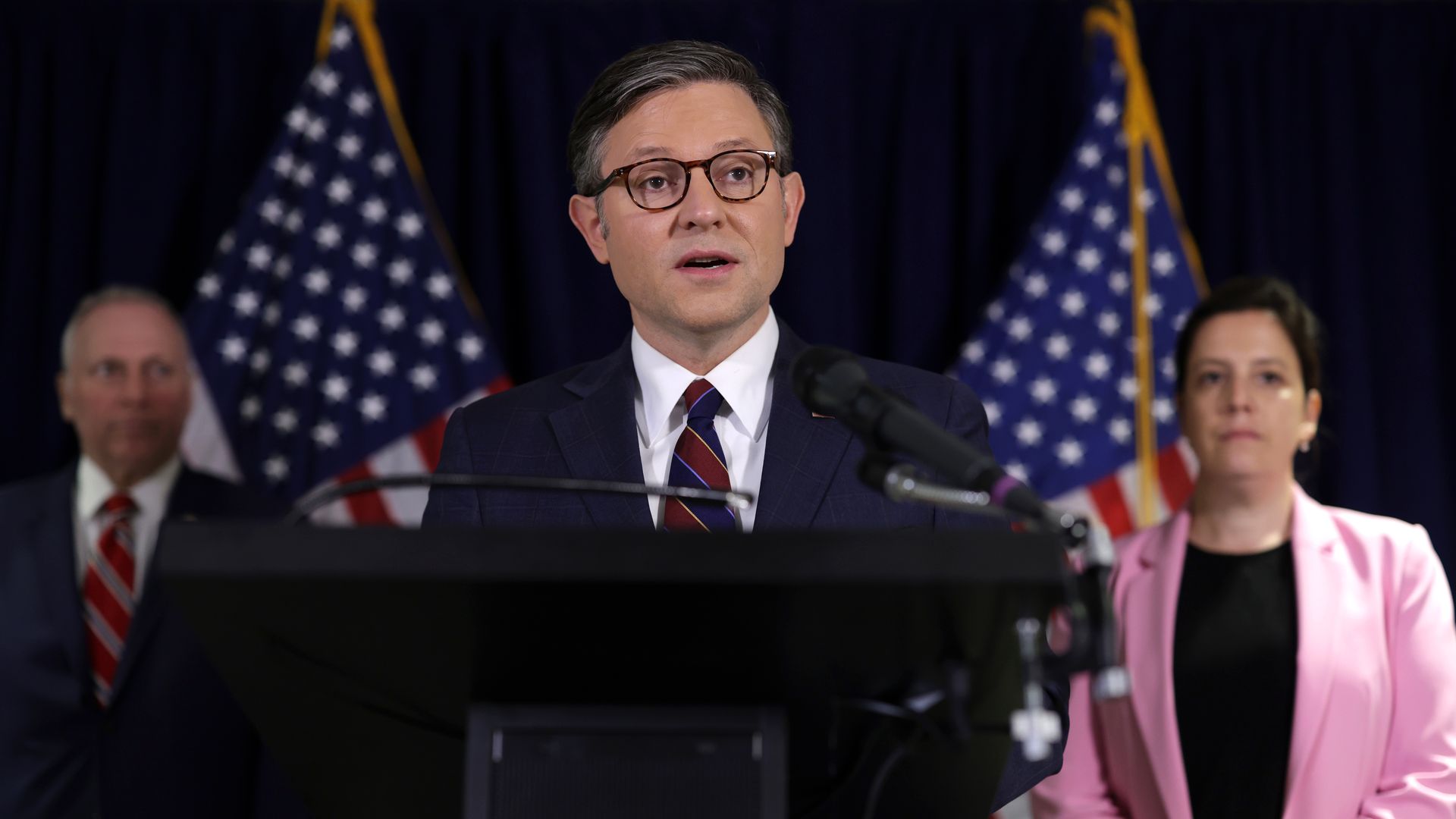 U.S. Speaker of the House Rep. Mike Johnson (R-LA) speaks as (L-R) House Majority Leader Rep. Steve Scalise (R-LA) and House Republican Conference Chair Rep. Elise Stefanik (R-NY) listen at the headquarters of the Republican National Committee 