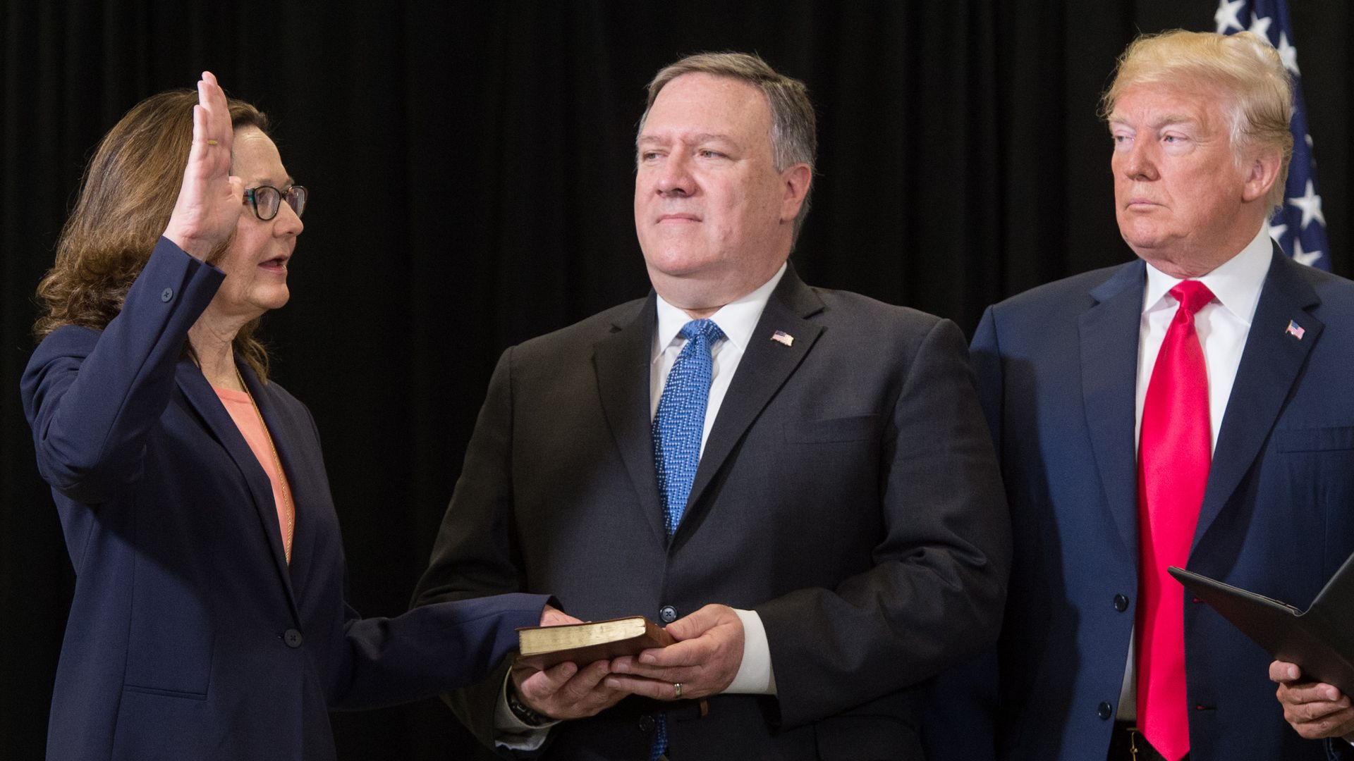 Gina Haspel is sworn in as the Director of the Central Intelligence Agency alongside President Trump and Secretary of State Mike Pompeo in Langley, Virginia, on May 21, 2018.
