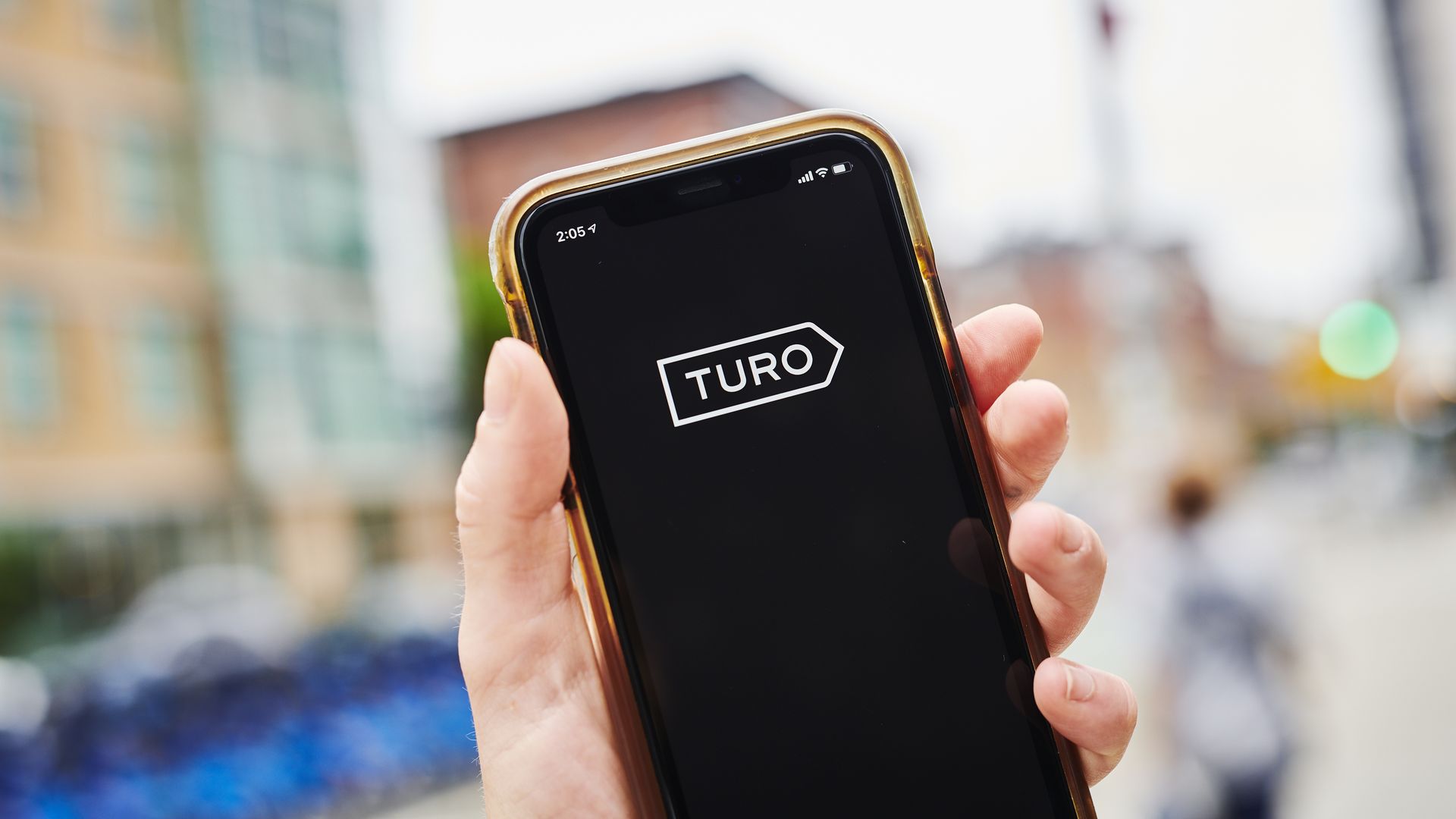 A smartphone with the Turo app