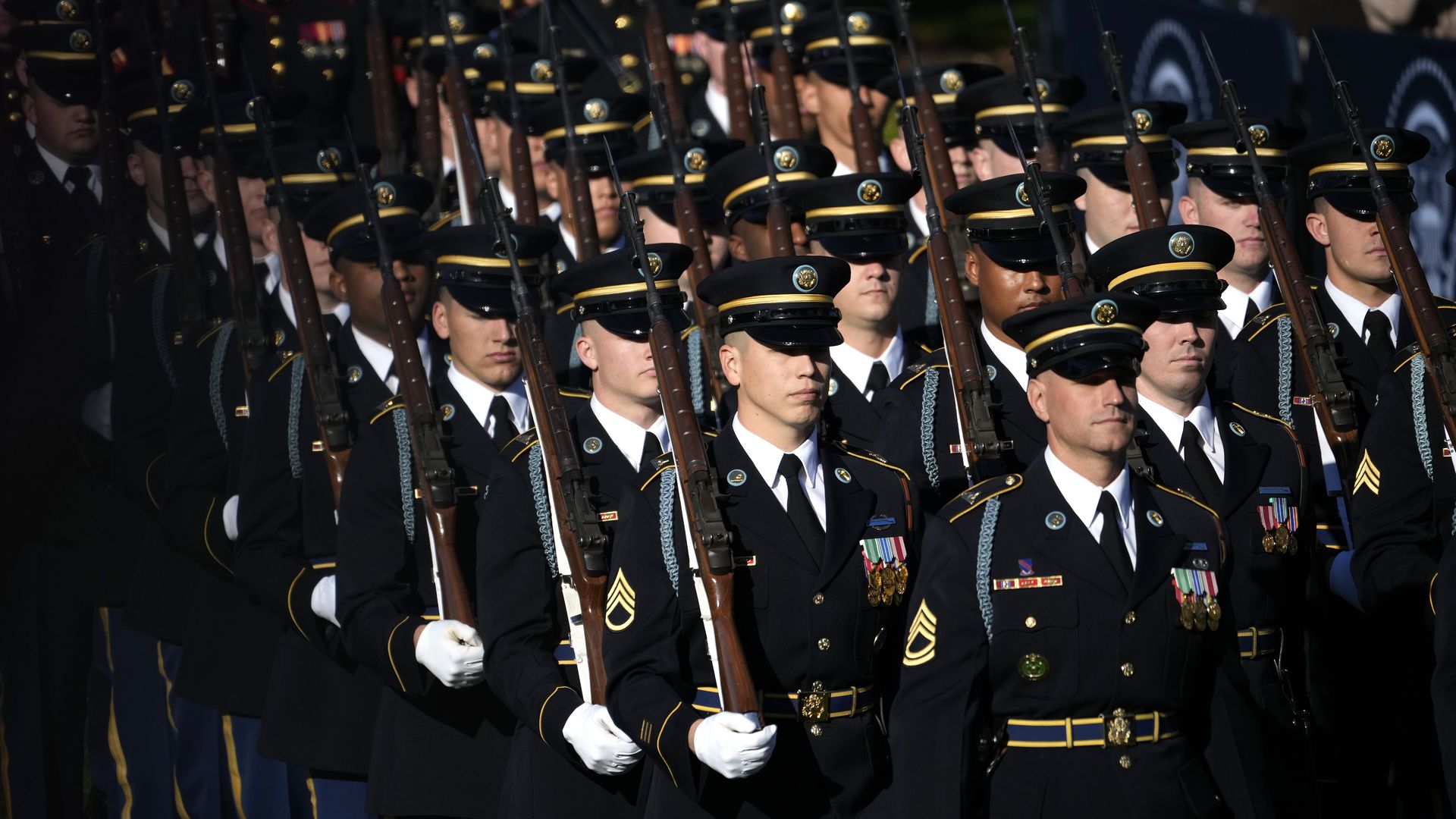Members of a military honor guard marching in Washington, D.C., in October 2023.