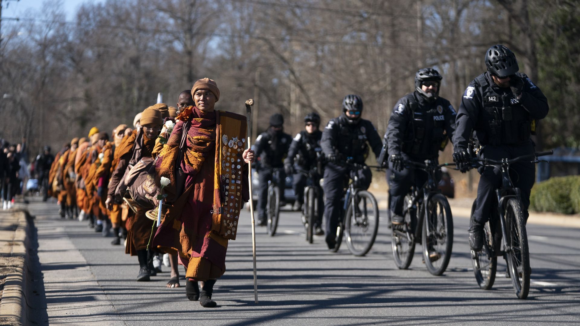CHARLOTTE, NORTH CAROLINA - JANUARY 15: The venerable Bhikkhu Pannakara leads Buddhist monks as they continue their Walk for Peace on January 15, 2026 in Charlotte, North Carolina. The monks are walking from Houston, Texas to Washington, D.C. spreading a message of mindfulness, unity and kindness wh