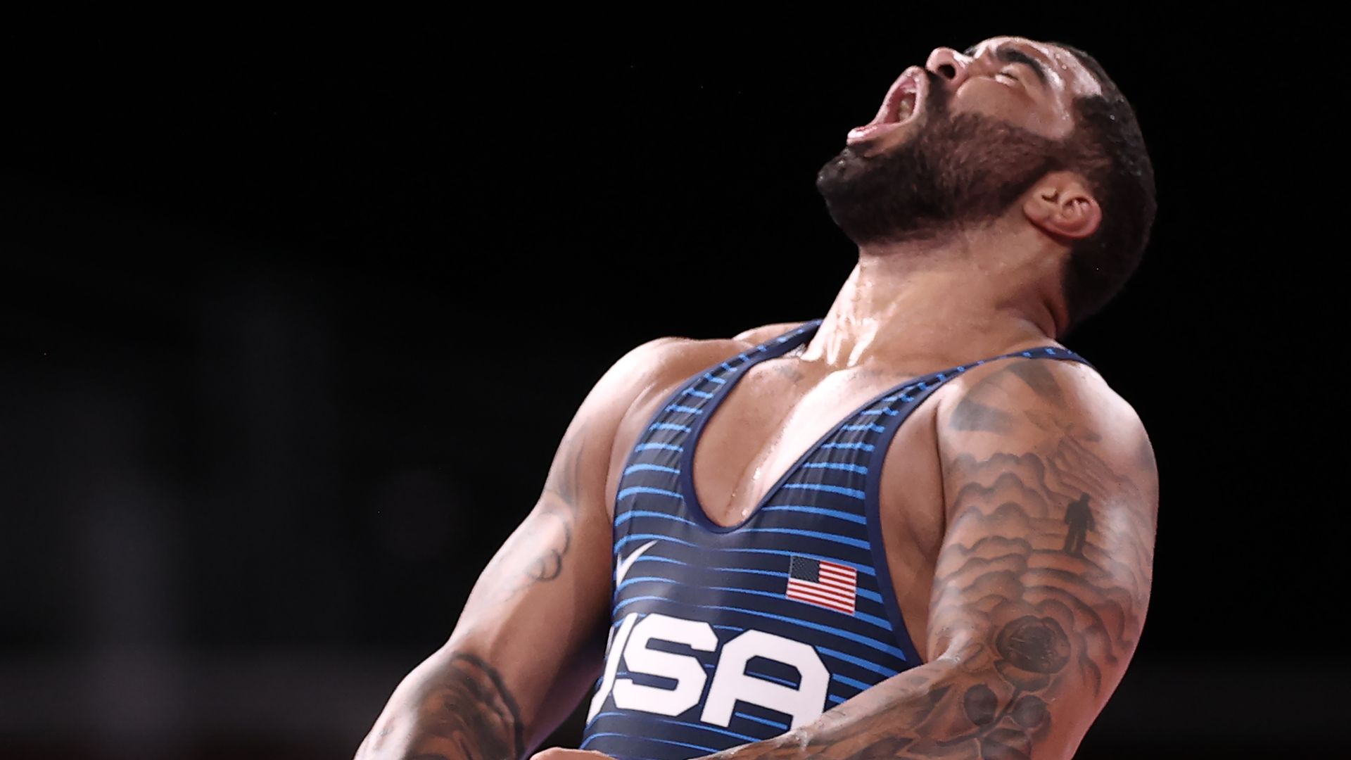 Team USA's Gable Dan Steveson celebrates victory in the men's 125kg freestyle wrestling final against Georgia's Geno Petriashvili