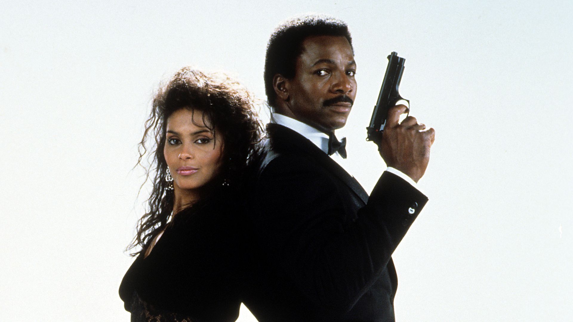 Publicity photo for "Action Jackson" with Carl Weathers, right, and Vanity.