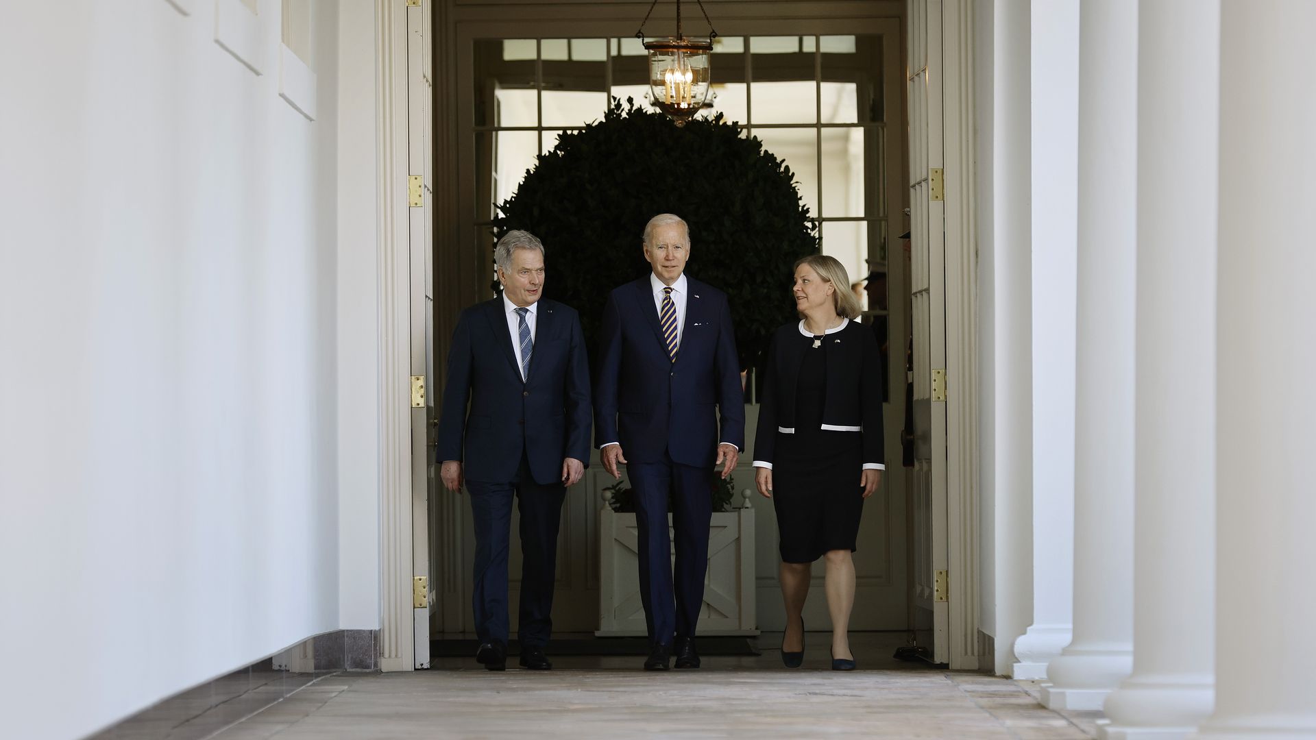 President Biden is seen walking to the Oval Office with the leaders of Finland and Sweden.