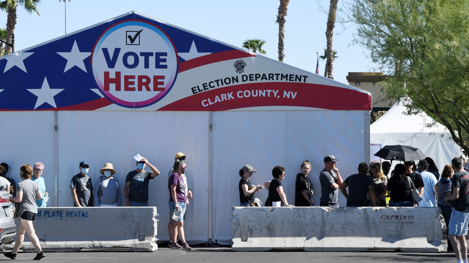 People waiting in a line to vote outside of a voting tent in Las Vegas, Nevada.