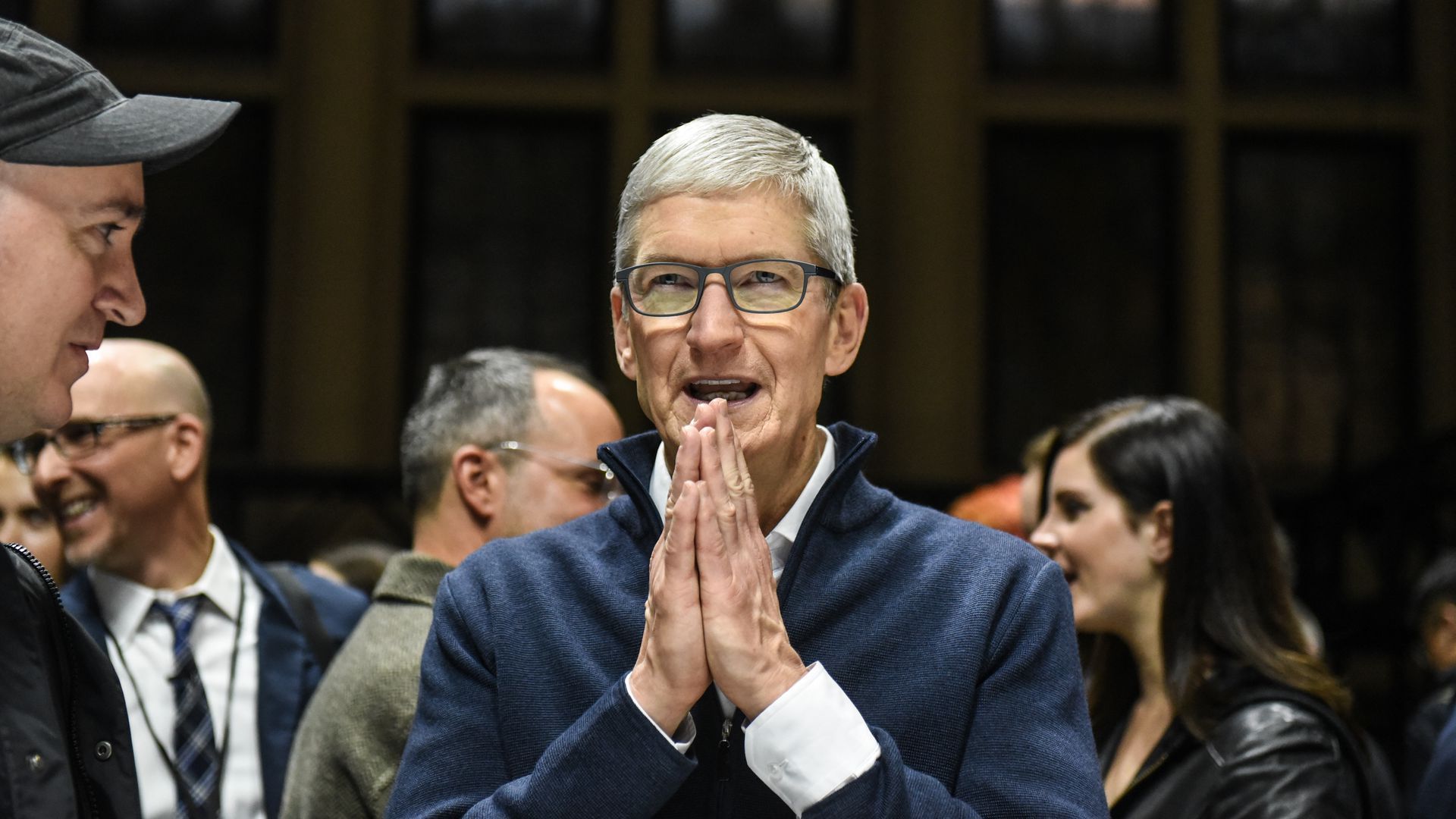 Apple CEO Tim Cook with hands together