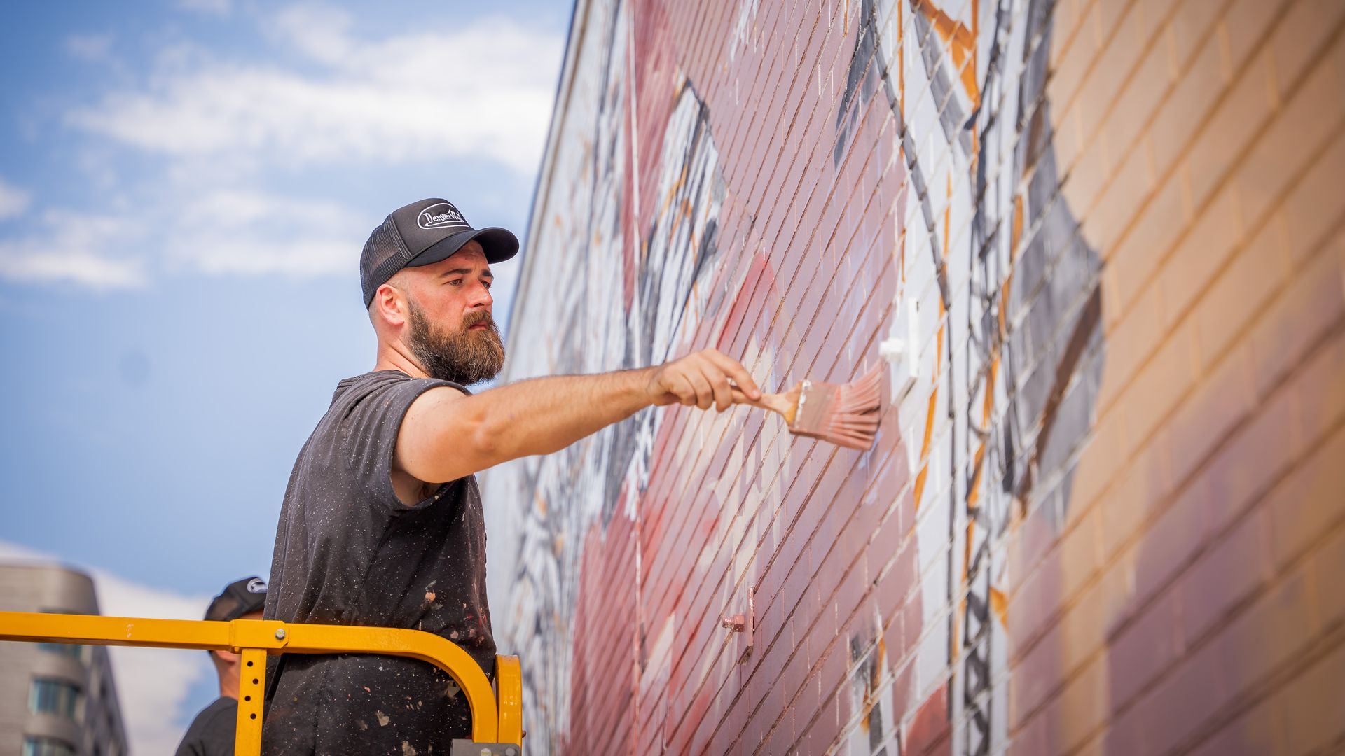 TelmoMiel from the Netherlands paints on the Truss House in the RiNo Art Park at 3400 Arkins Court. Photo courtesy of  Dittlo Digital and Prophecy Media