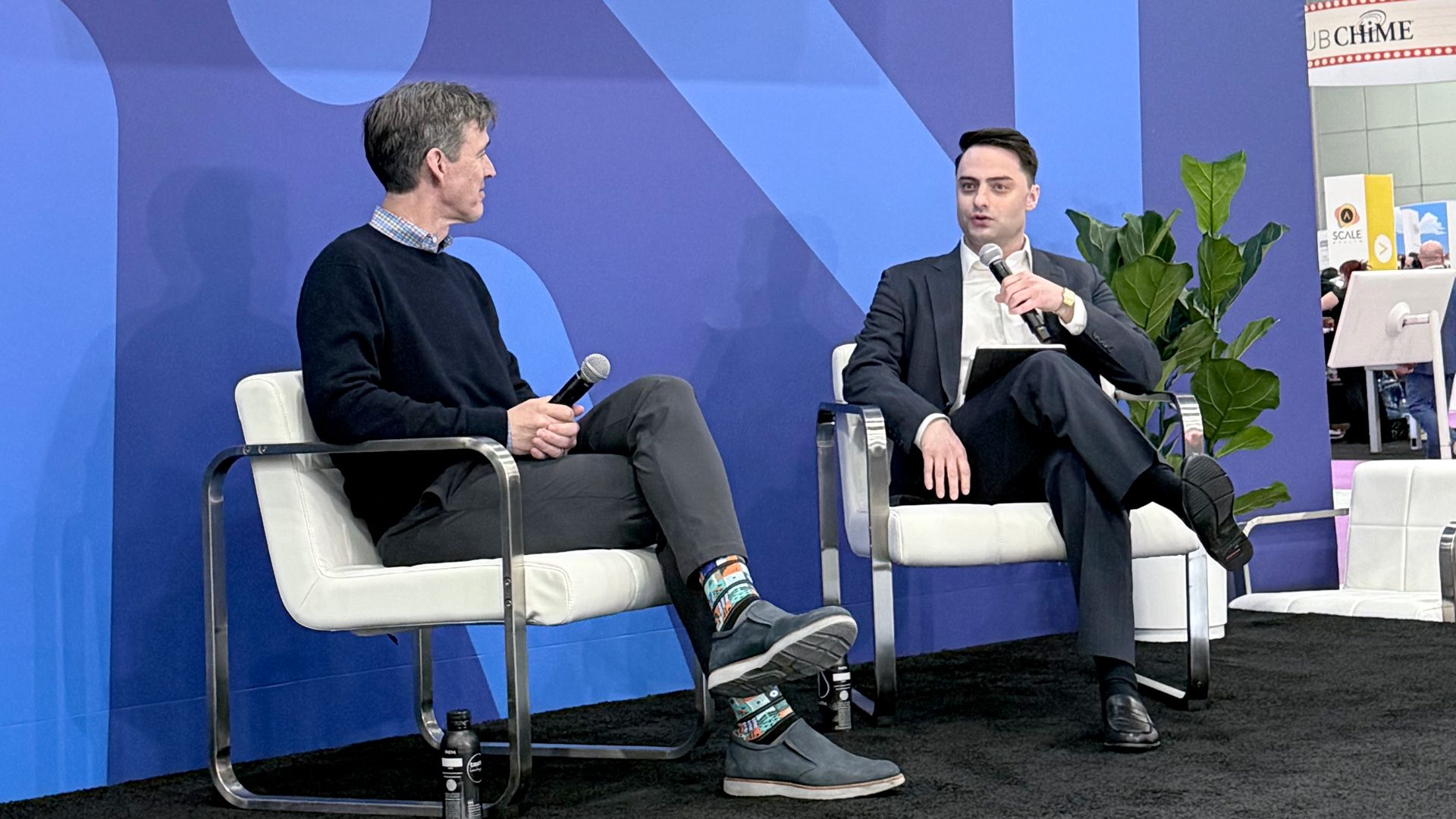 Axios Pro's Brock Turner on stage at VIVE with Doximity's CEO Jeff Tangney