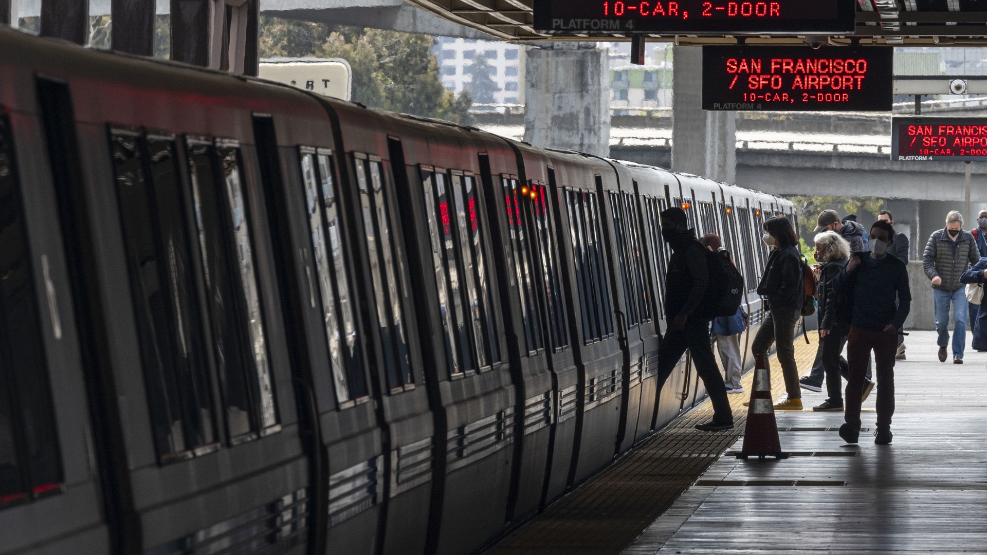 Photo of commuters boarding a BART train