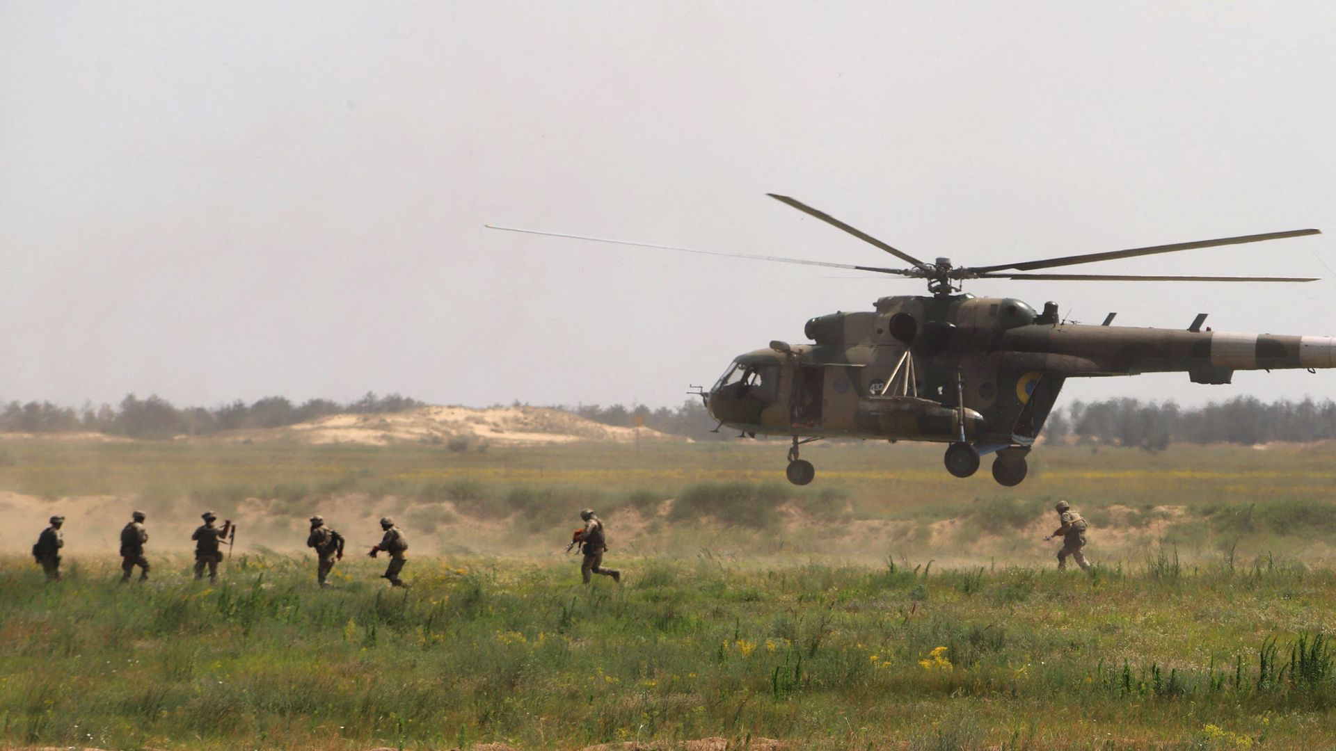 Ukrainian army servicemen take part in the Sea Breeze drills at the shooting range in the Kherson region of Ukraine on July 2, 2021.