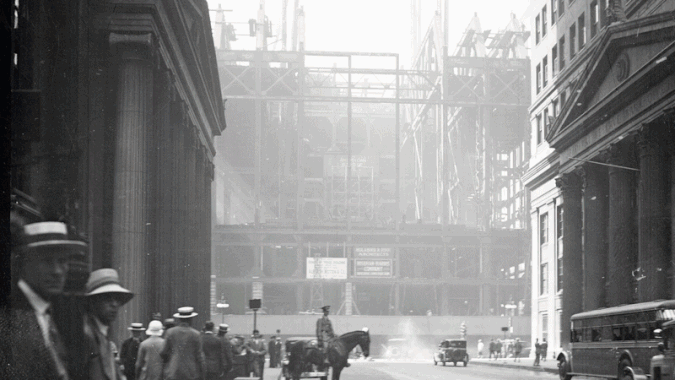 A GIF of a building under construction turning into a completed skyscraper.