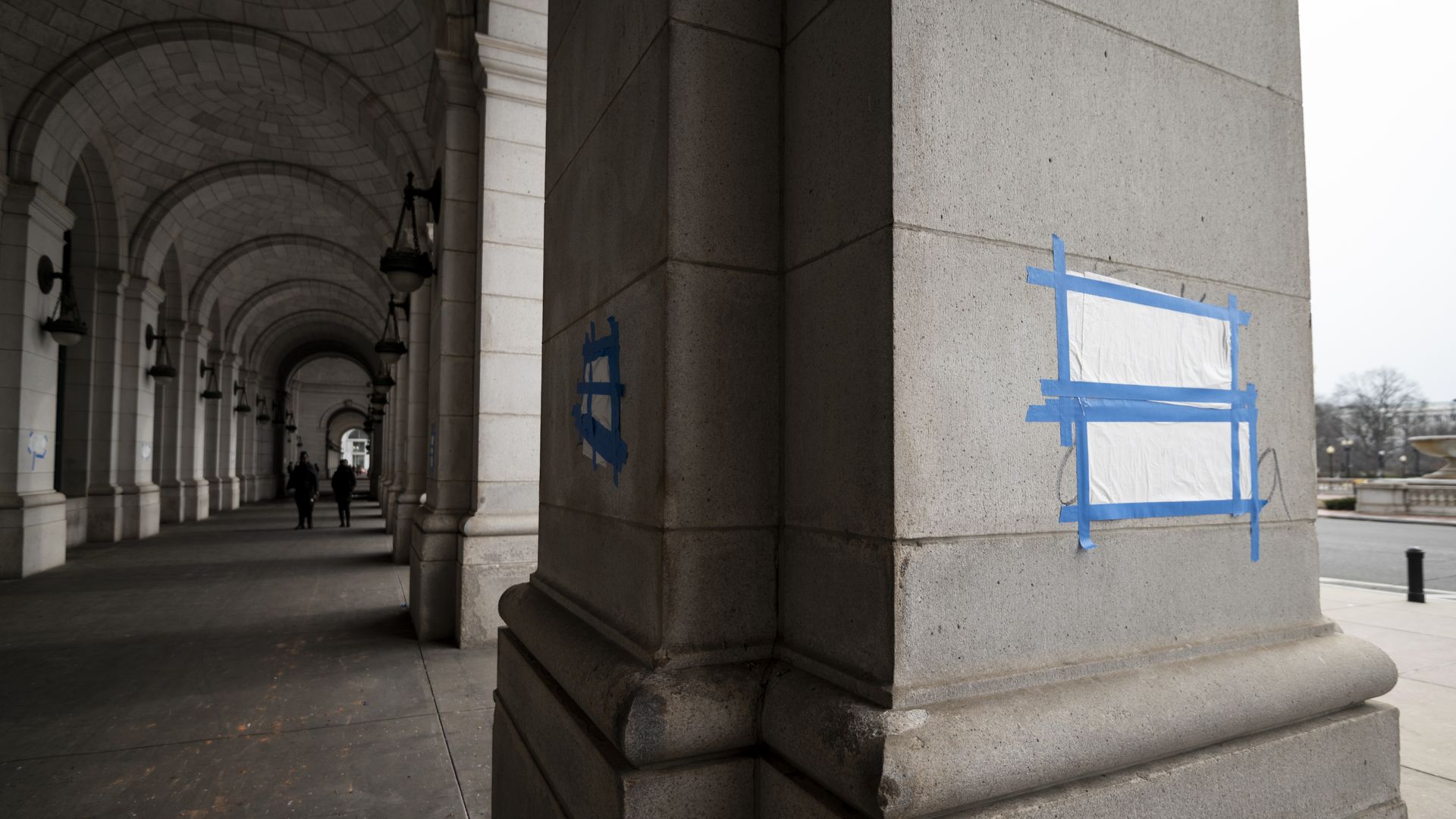 Dozens of swastikas and anti-Obama slogans, most of them covered up by workers, were drawn on pillars around the exterior of Union Station in Washington on Friday, Januarey 28, 2022. 