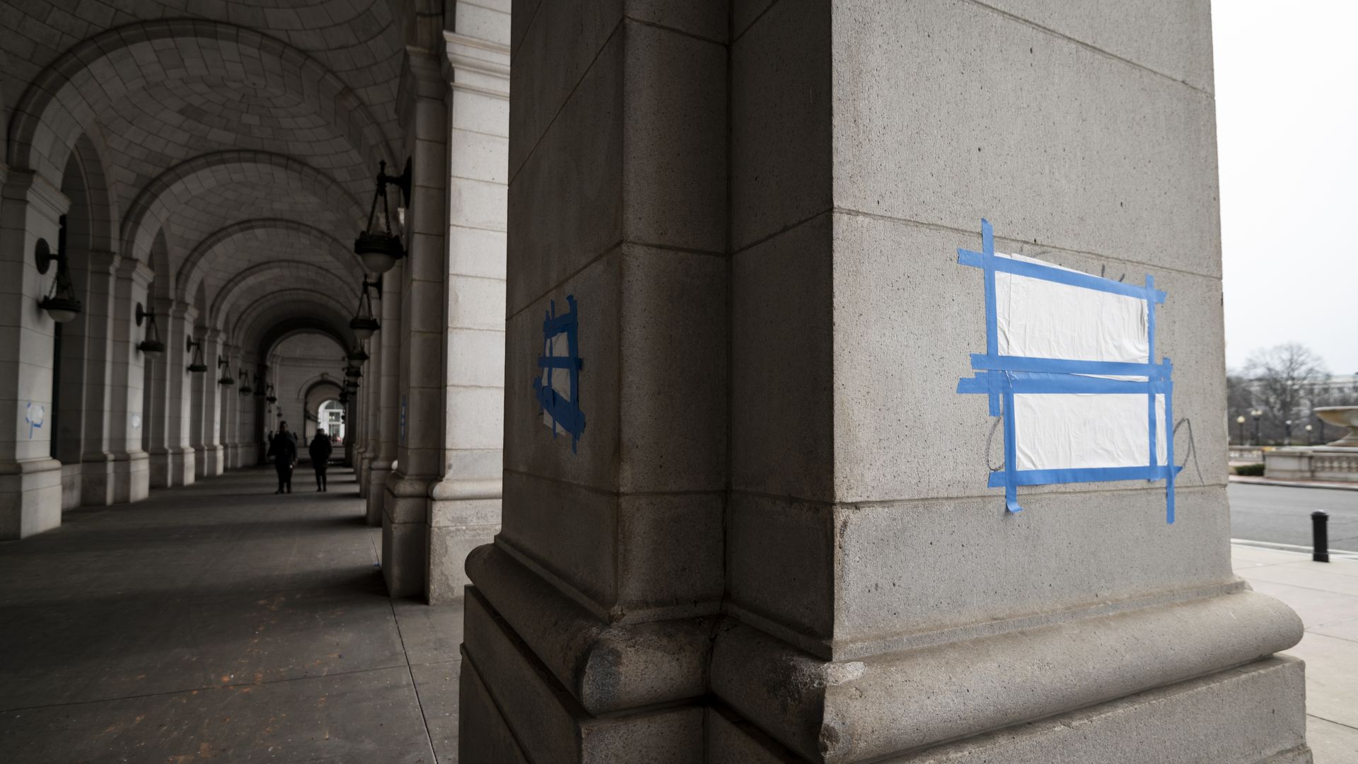 Dozens of swastikas and anti-Obama slogans, most of them covered up by workers, were drawn on pillars around the exterior of Union Station in Washington on Friday, Januarey 28, 2022.