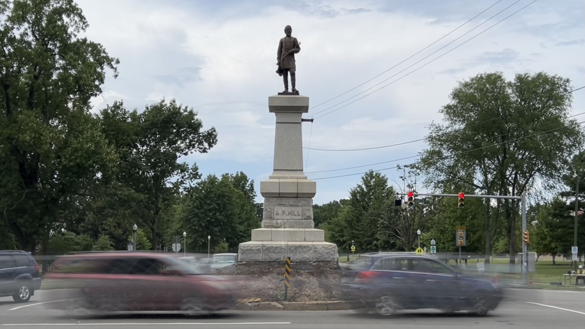 The A.P. Hill., the last confederate statue in Richmond, stands in the middle of an intersection while cars whirl by