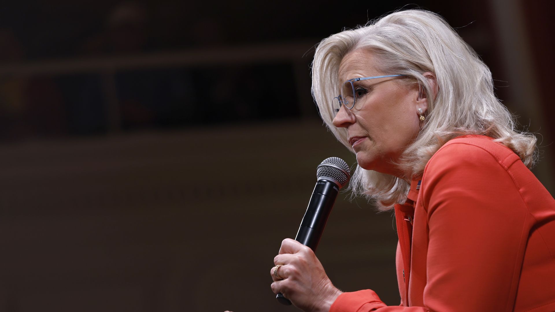 Former Rep. Liz Cheney looks on as she speaks about her book, "Oath and Honor: A Memoir and a Warning."