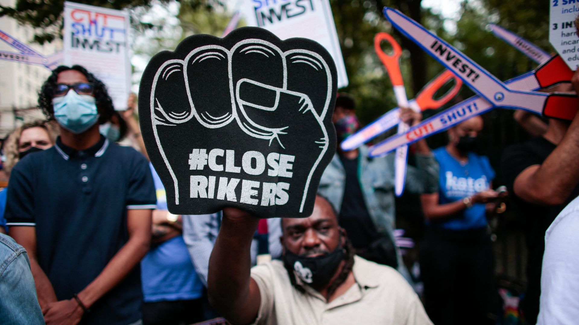 Demonstrators call for the closing of the Rikers Island prions